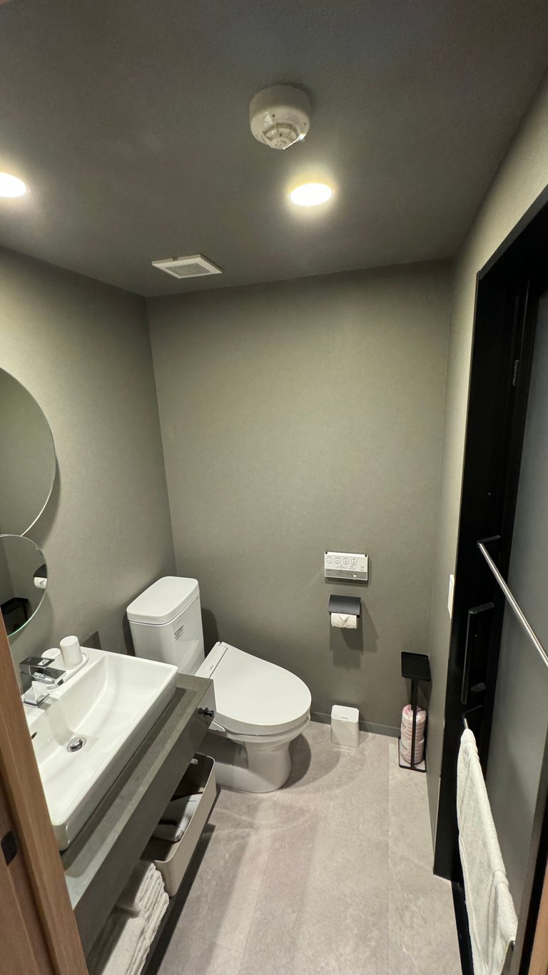 premium two bedroom suite bedroom 1 toilet and shower room 768x1365