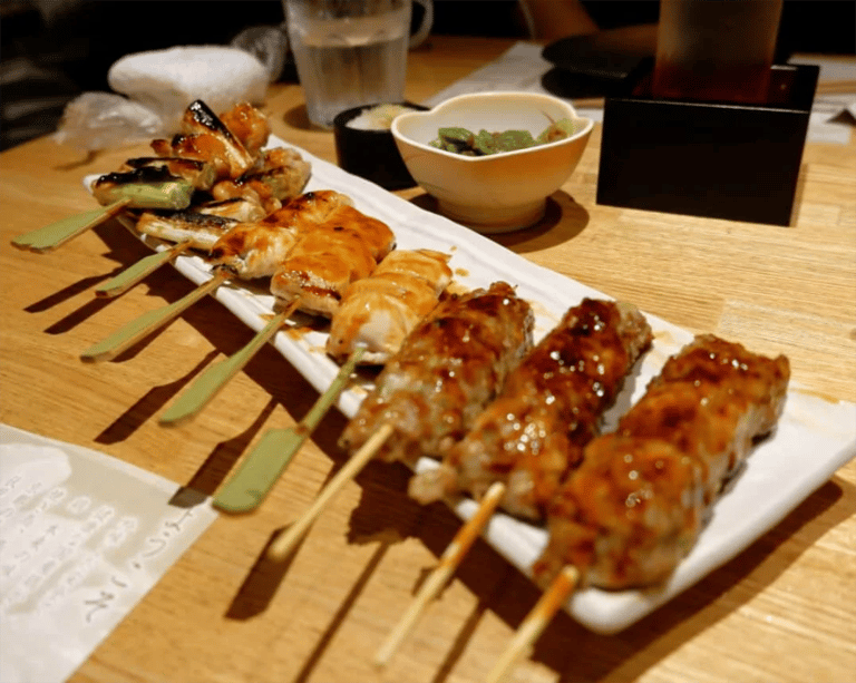 accessible kyoto pontocho tour yakitori skewers 768x614