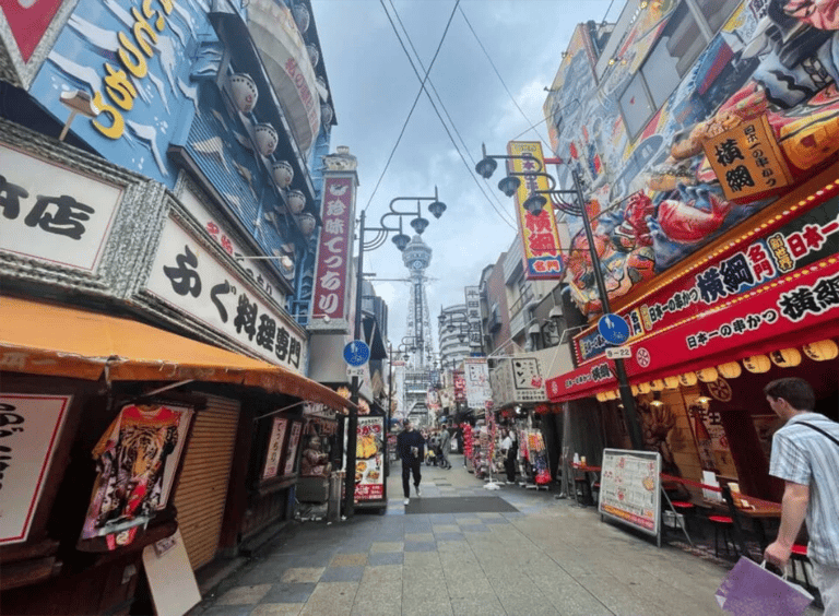 accessible osaka shinsekai daytime tour colorful shopping street 768x565