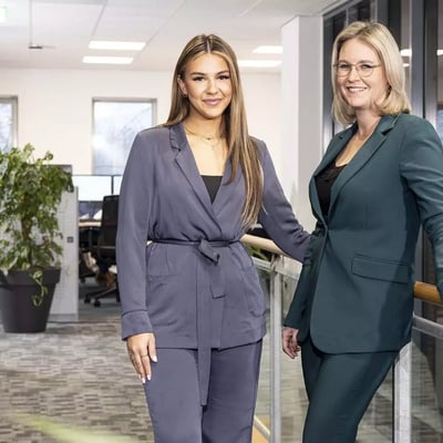 Two women looking at laptop