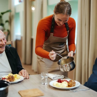 Two women looking at laptop