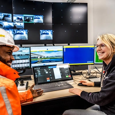 Two women looking at laptop