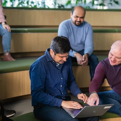 Two women looking at laptop