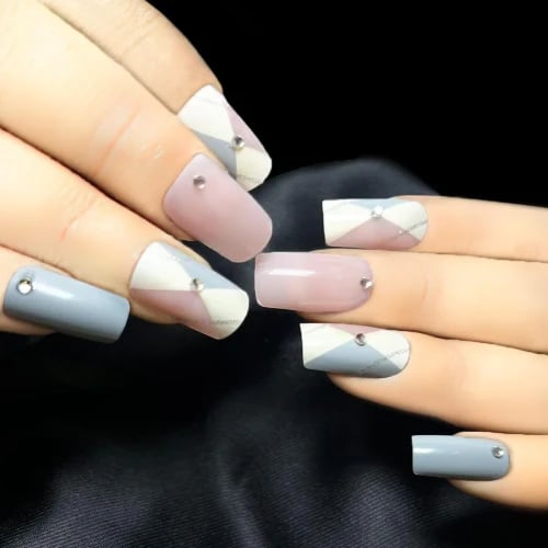 Secret Lives® translucent pink acrylic press on nails designer artifical nail extension grey & cream with silver gliiter and stud design 24 pieces set with manicure kit convinent than manicure
