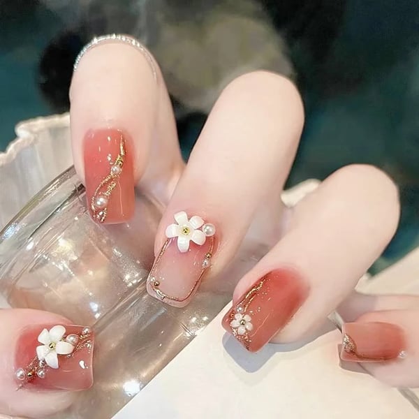 Secret Lives® acrylic press on nails designer artifical fake nail extension glossy redish peach color with 3D white flower white & golden pearl with golden glitter design set of 24 pieces