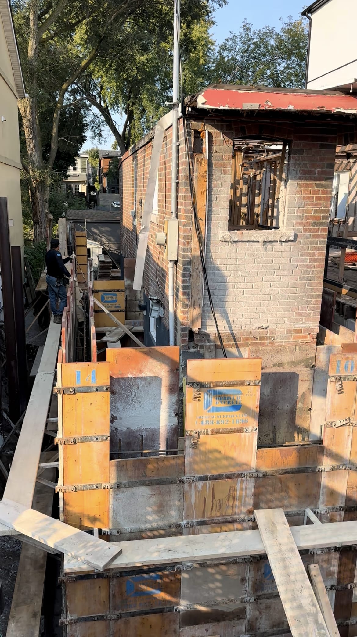 Foundation extension walls formed and braced for concrete pour in East York residential project