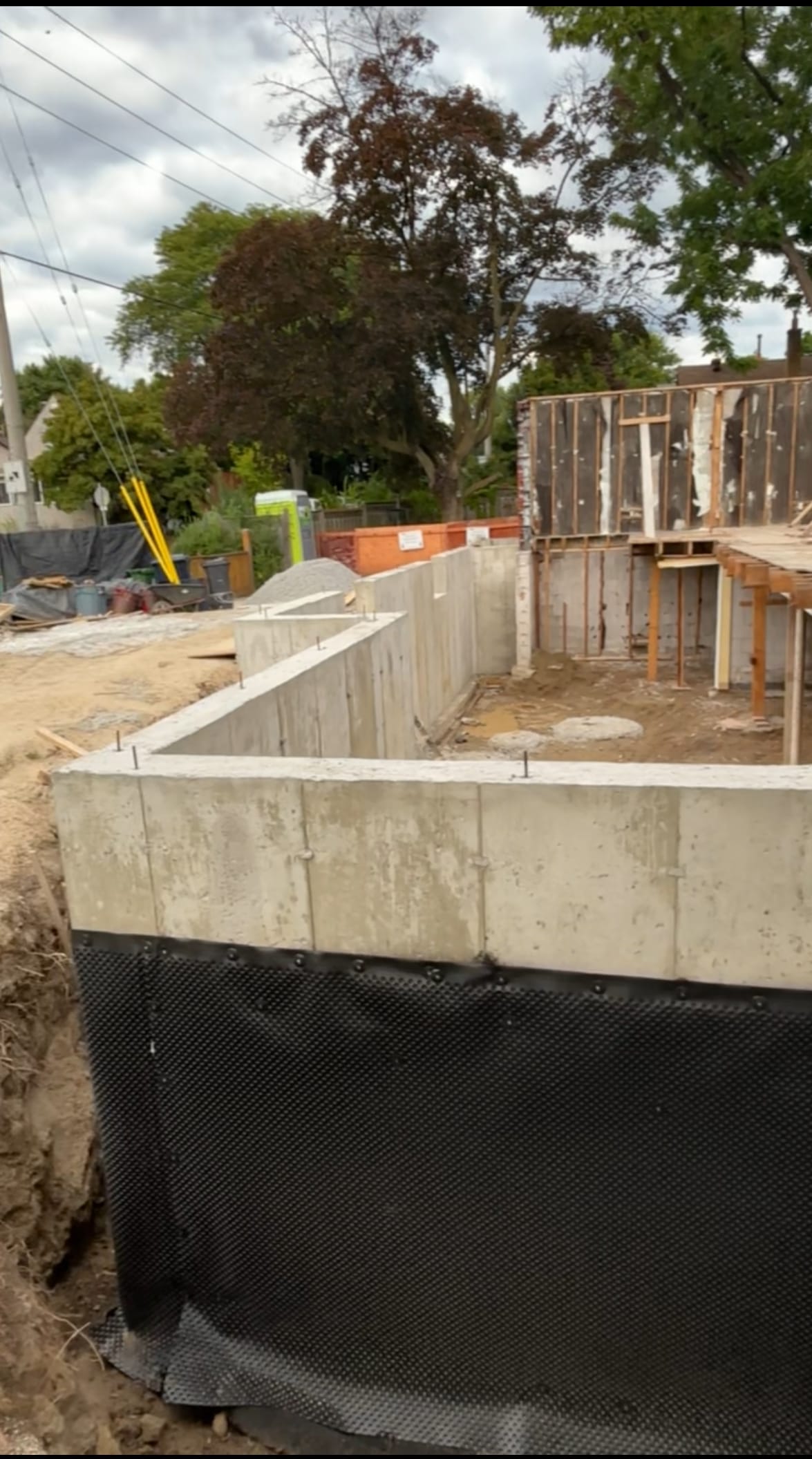 Foundation extension backfilling with waterproofed walls connecting to existing East York home structure