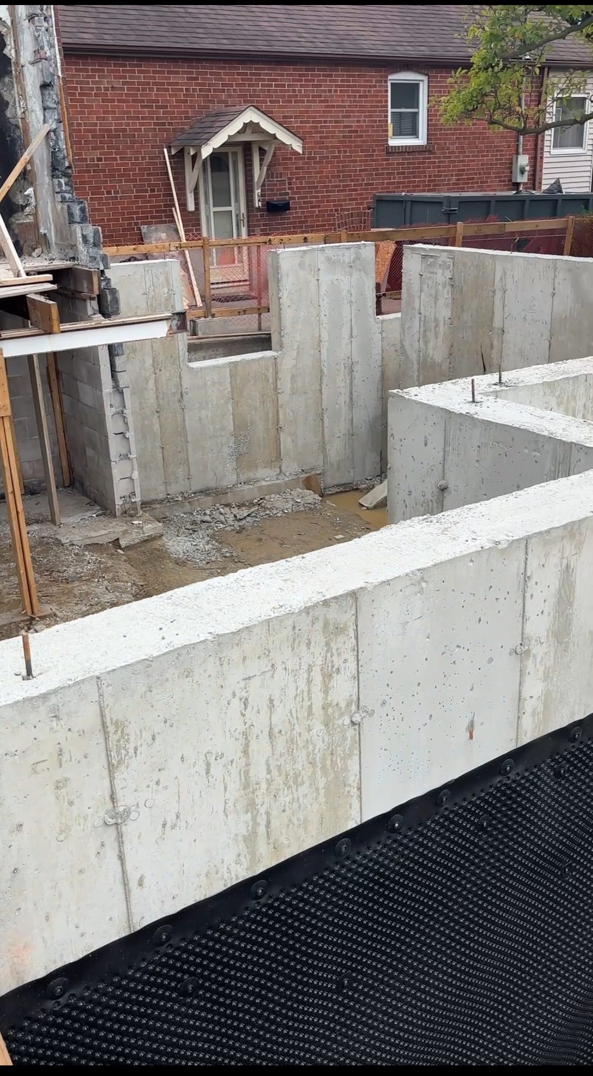 Waterproofing application on foundation extension walls for East York residential home expansion project
