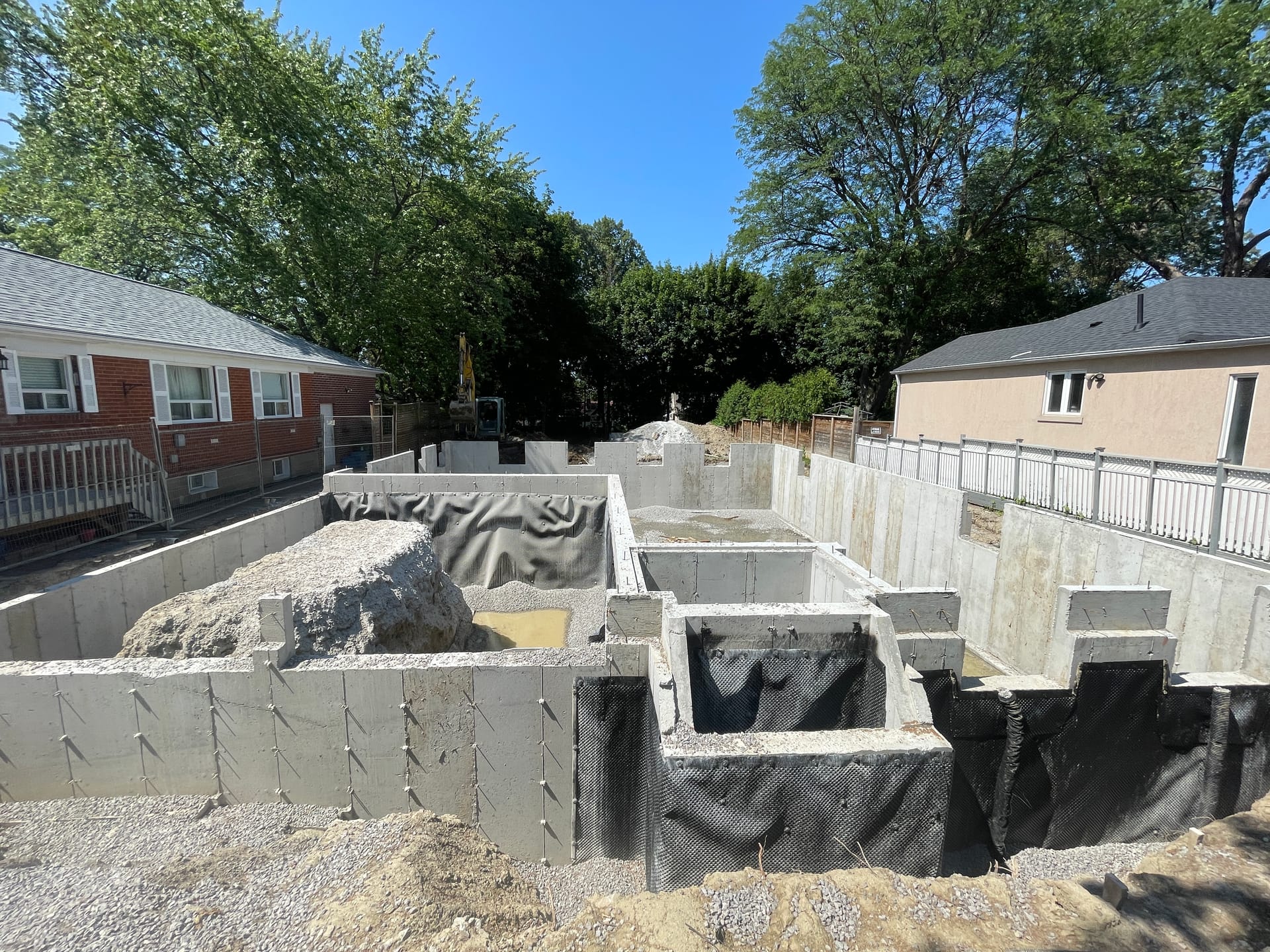 Waterproofed garden suite foundation walls in Etobicoke backyard construction project