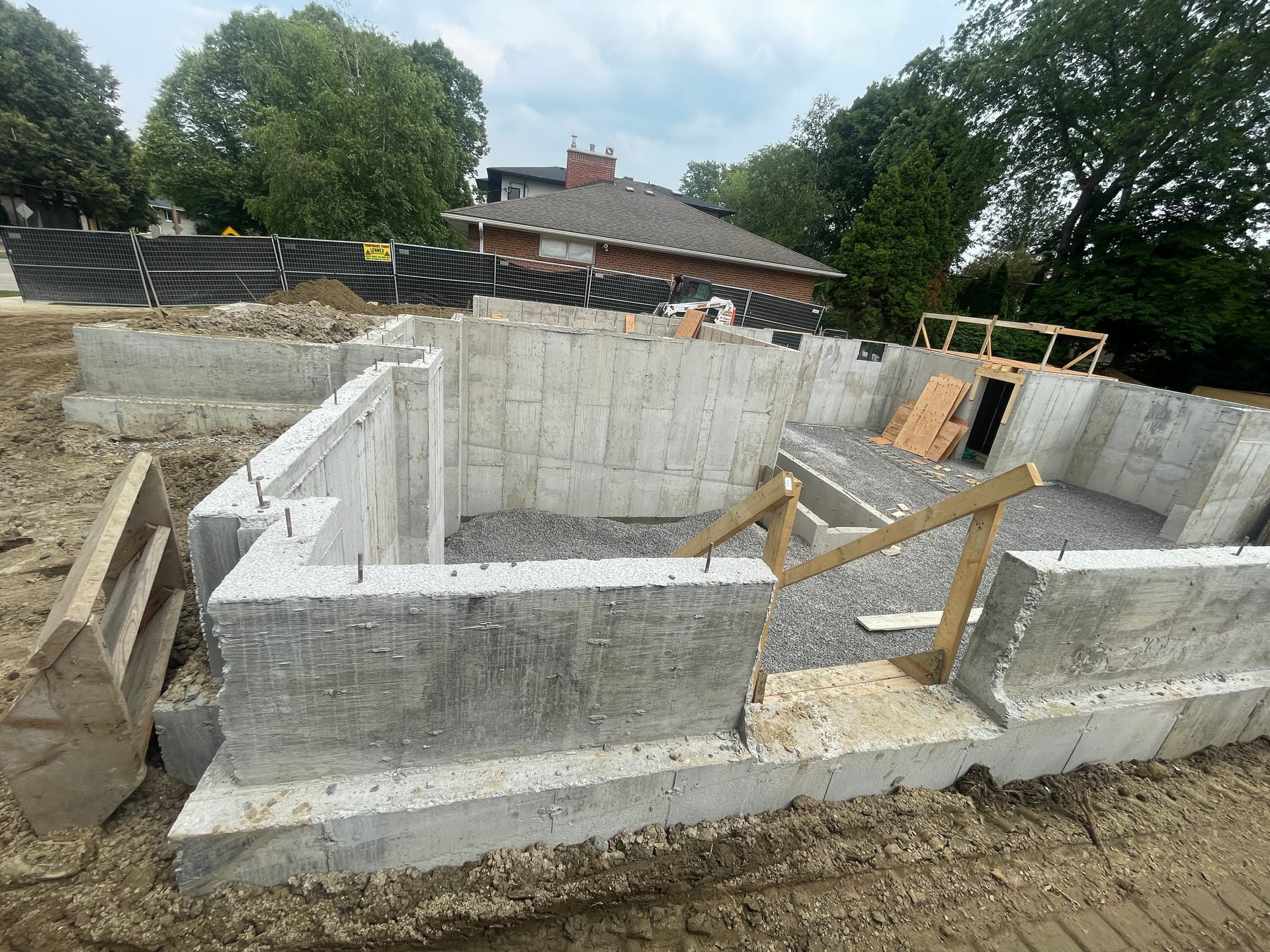 Backfilled foundation walls for large custom residential home in Etobicoke