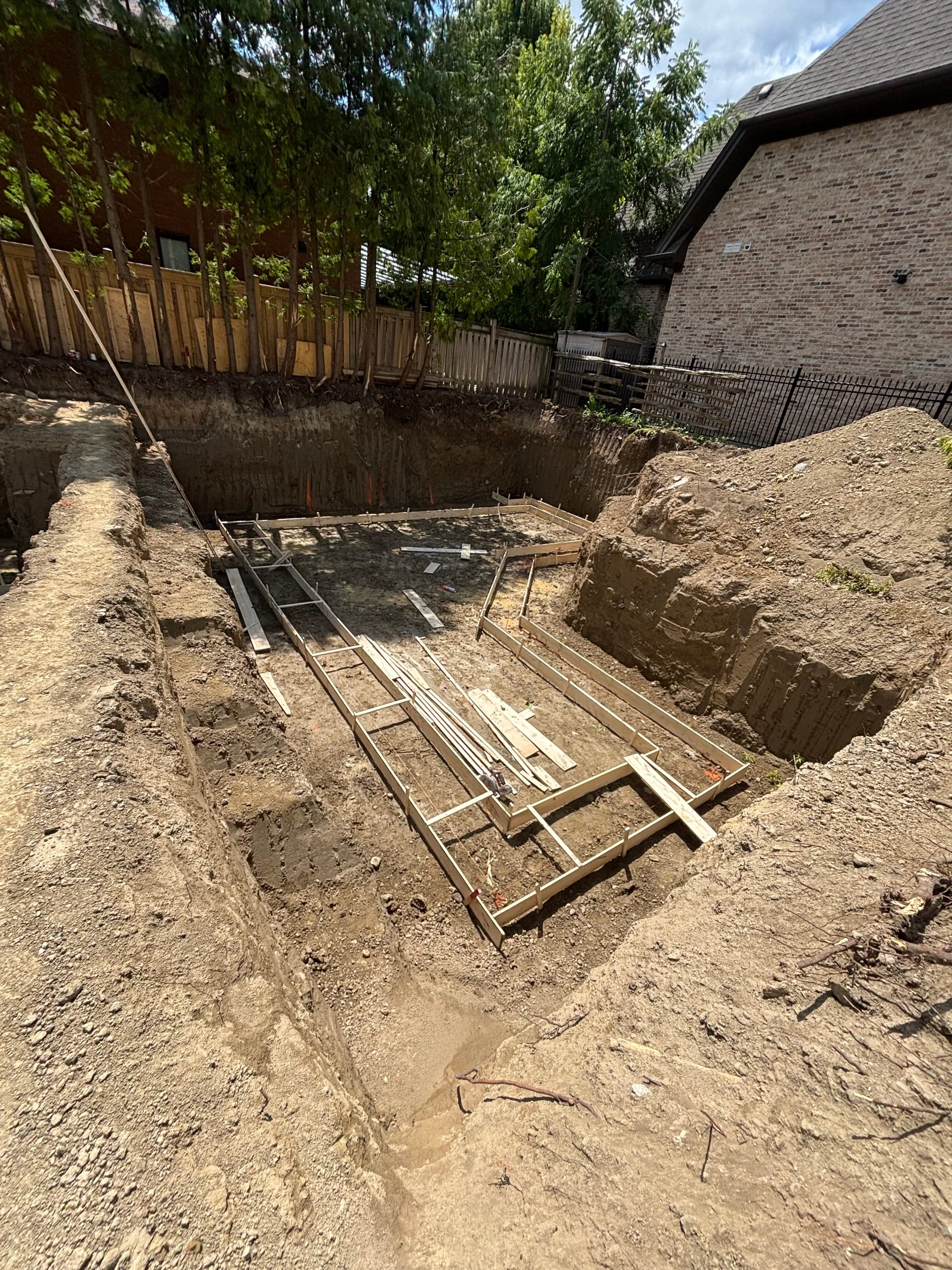 Garden suite footing formwork construction in Etobicoke residential development project