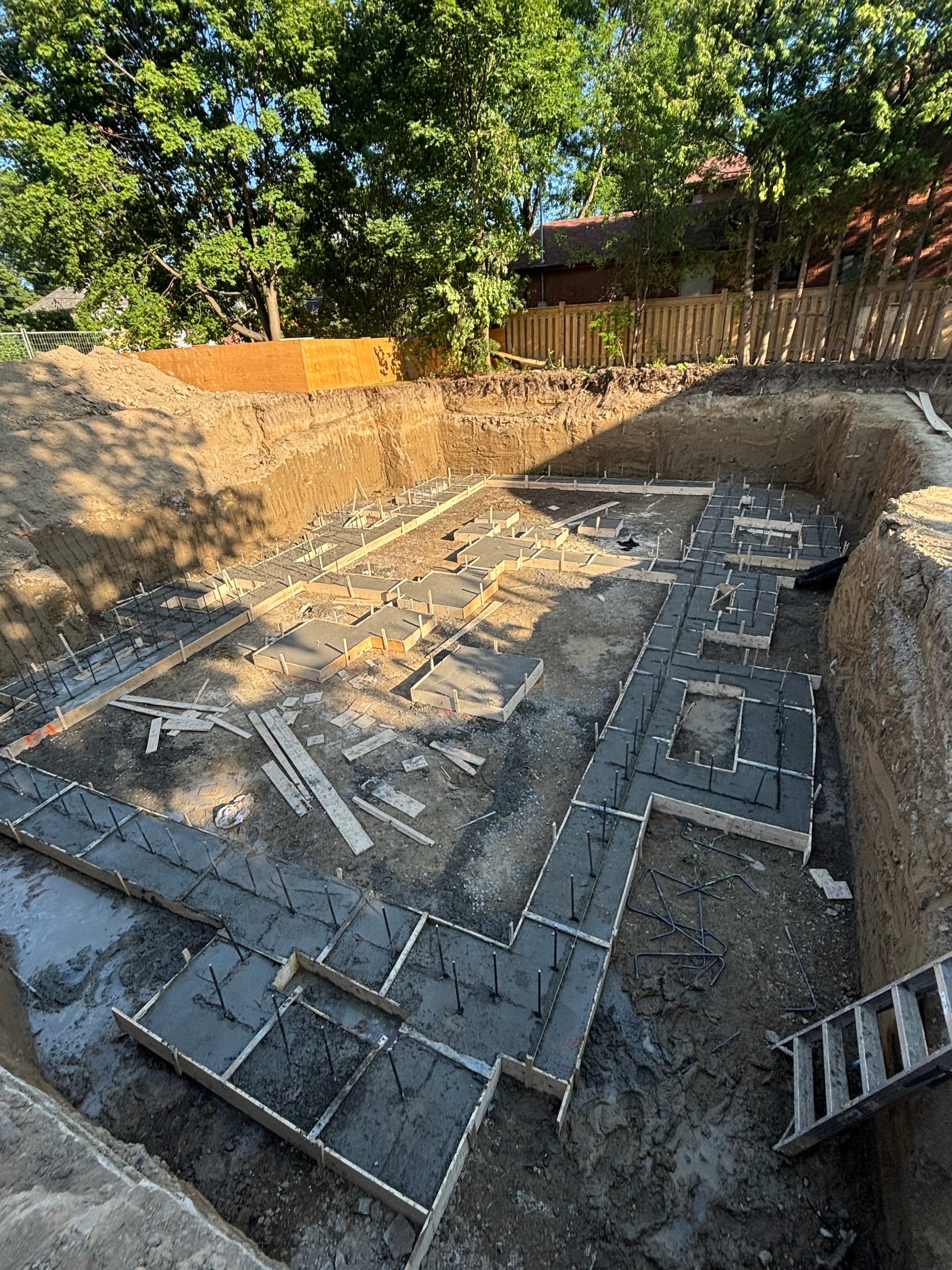 Multiplex foundation wall assembly with 16-inch rebar spacing in Etobicoke Toronto