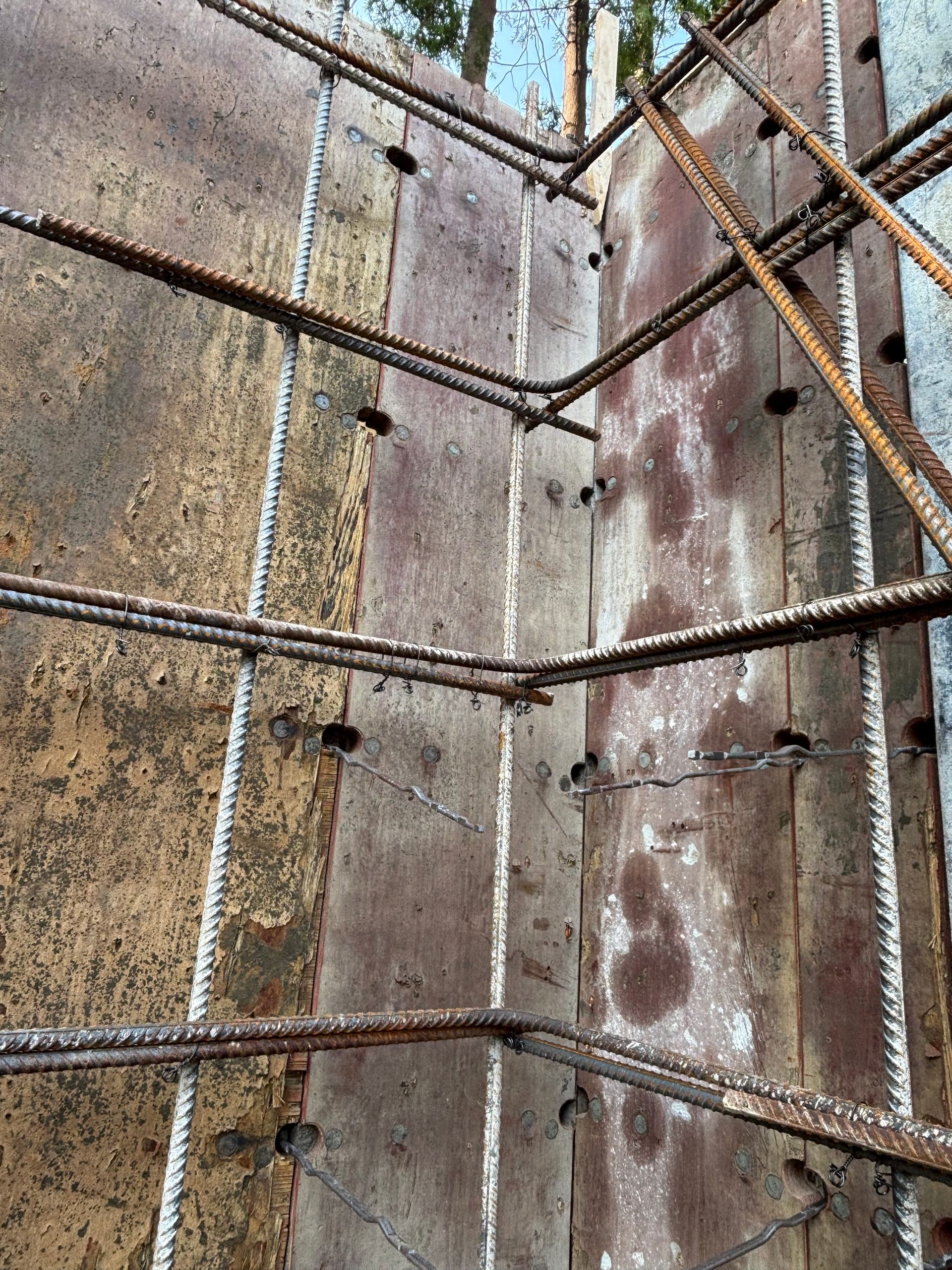 Aerial view of multiplex foundation walls with window wells and garden suite in Etobicoke