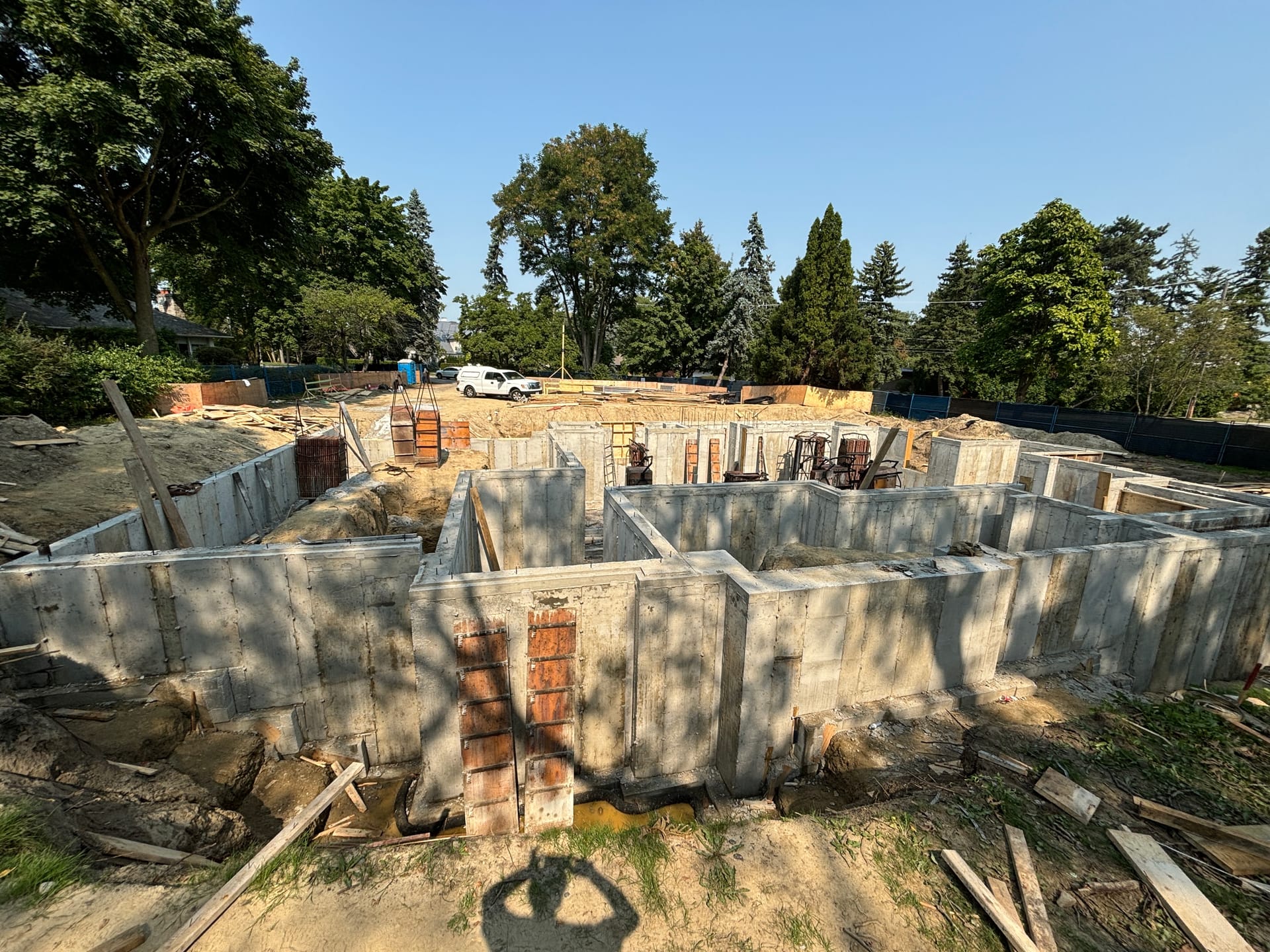 Completed waterproofed foundation walls ready for backfill at Etobicoke Lorraine Gardens residential construction site