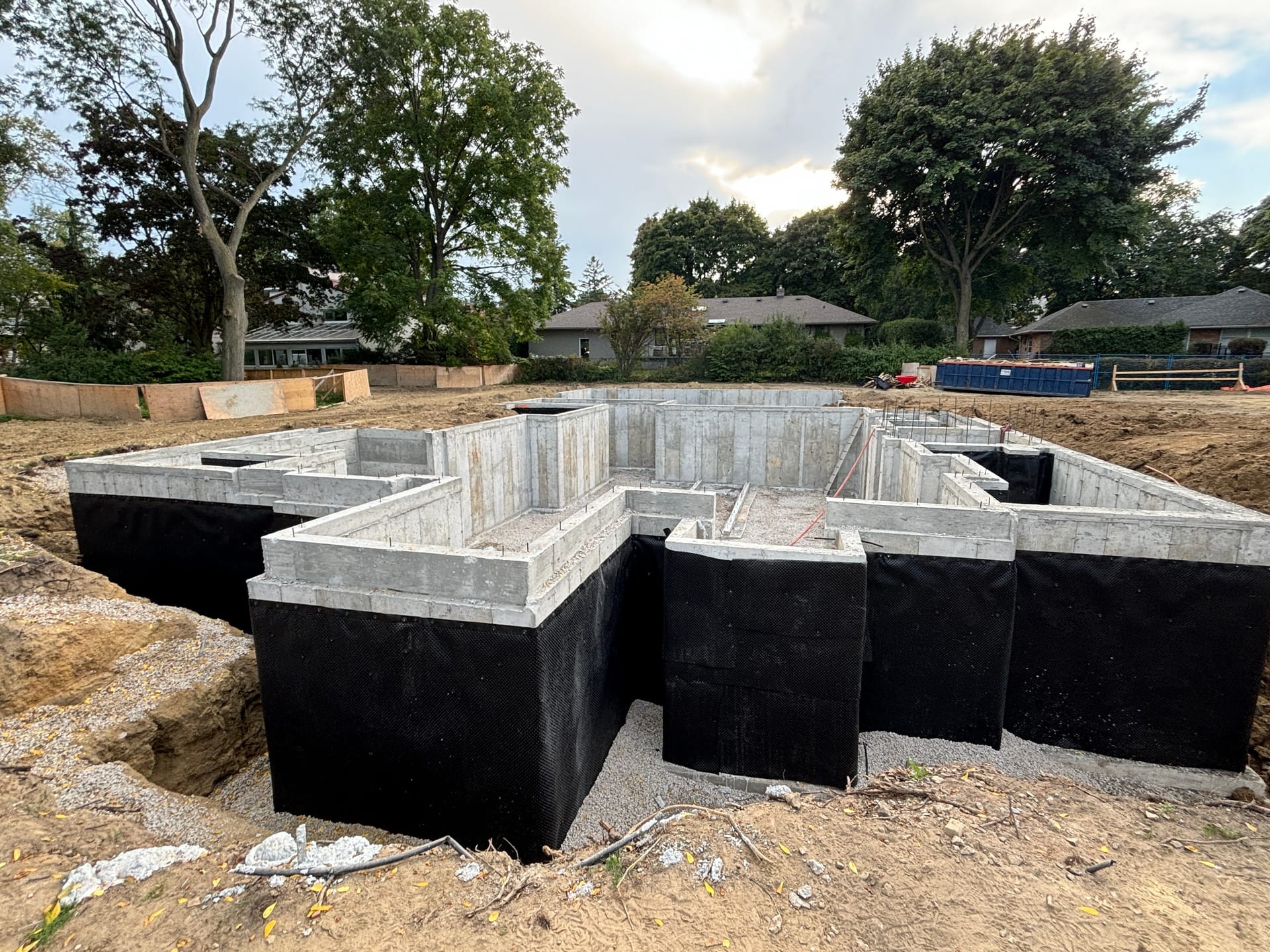Pristine completed foundation with professional waterproofing membrane at Lorraine Gardens Etobicoke custom home project