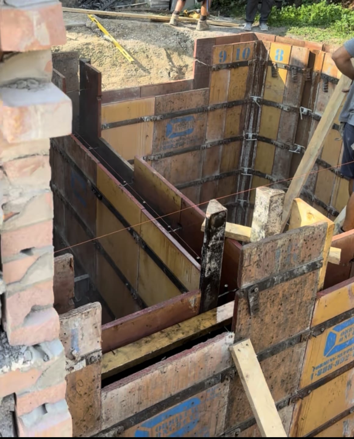 Etobicoke foundation extension walls assembled with formwork and bracing before concrete pour