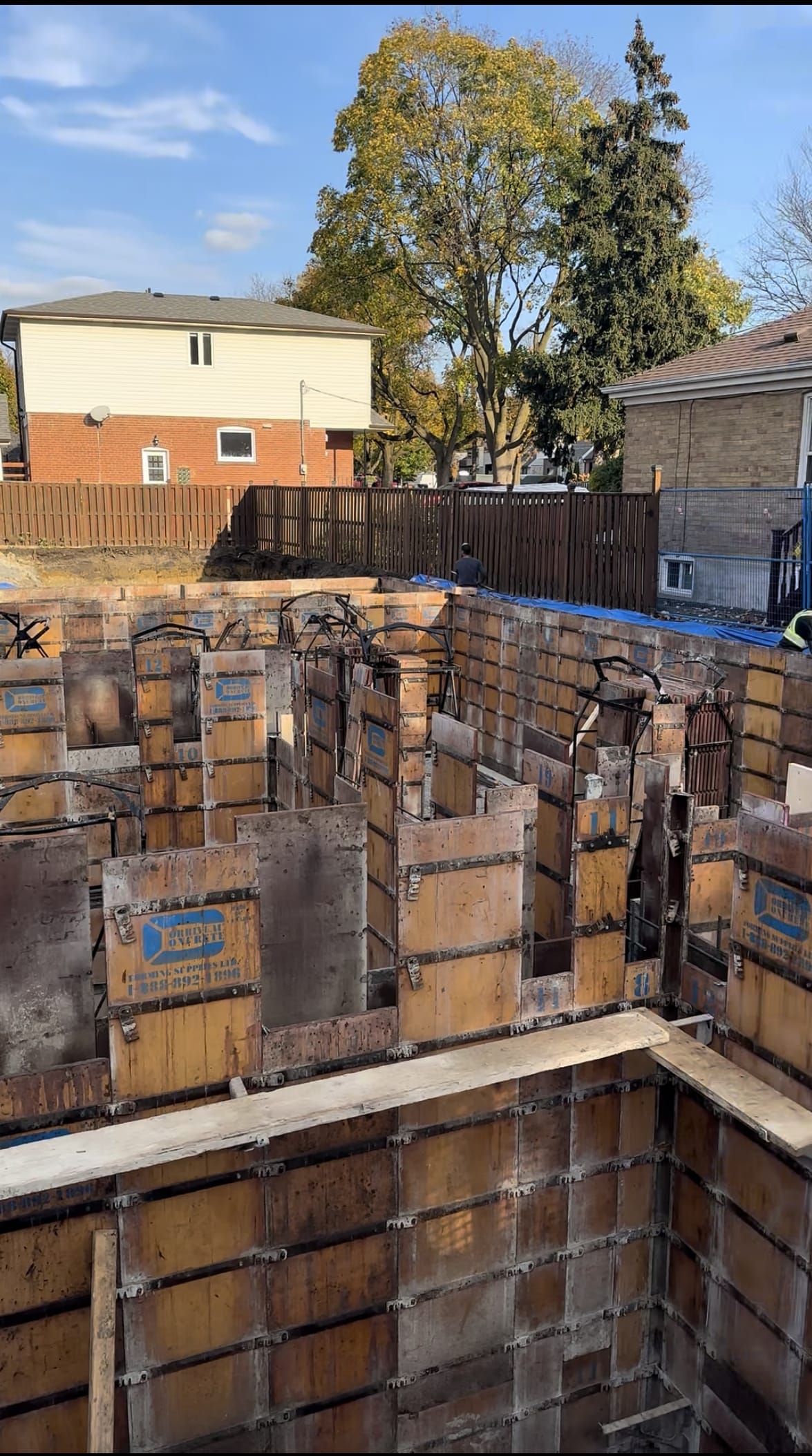 Assembled formwork walls braced and ready for concrete pour in Etobicoke extension
