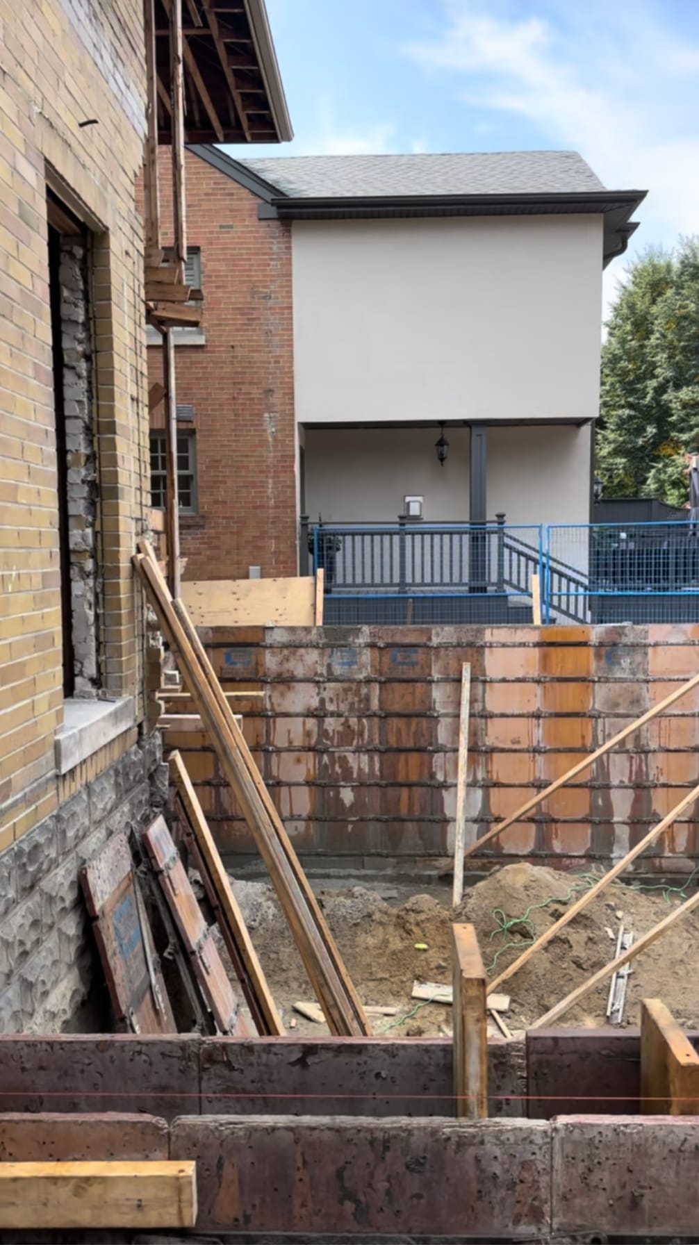 Backfilled foundation extension at 18 Wilgar Road in Etobicoke showing finished grade