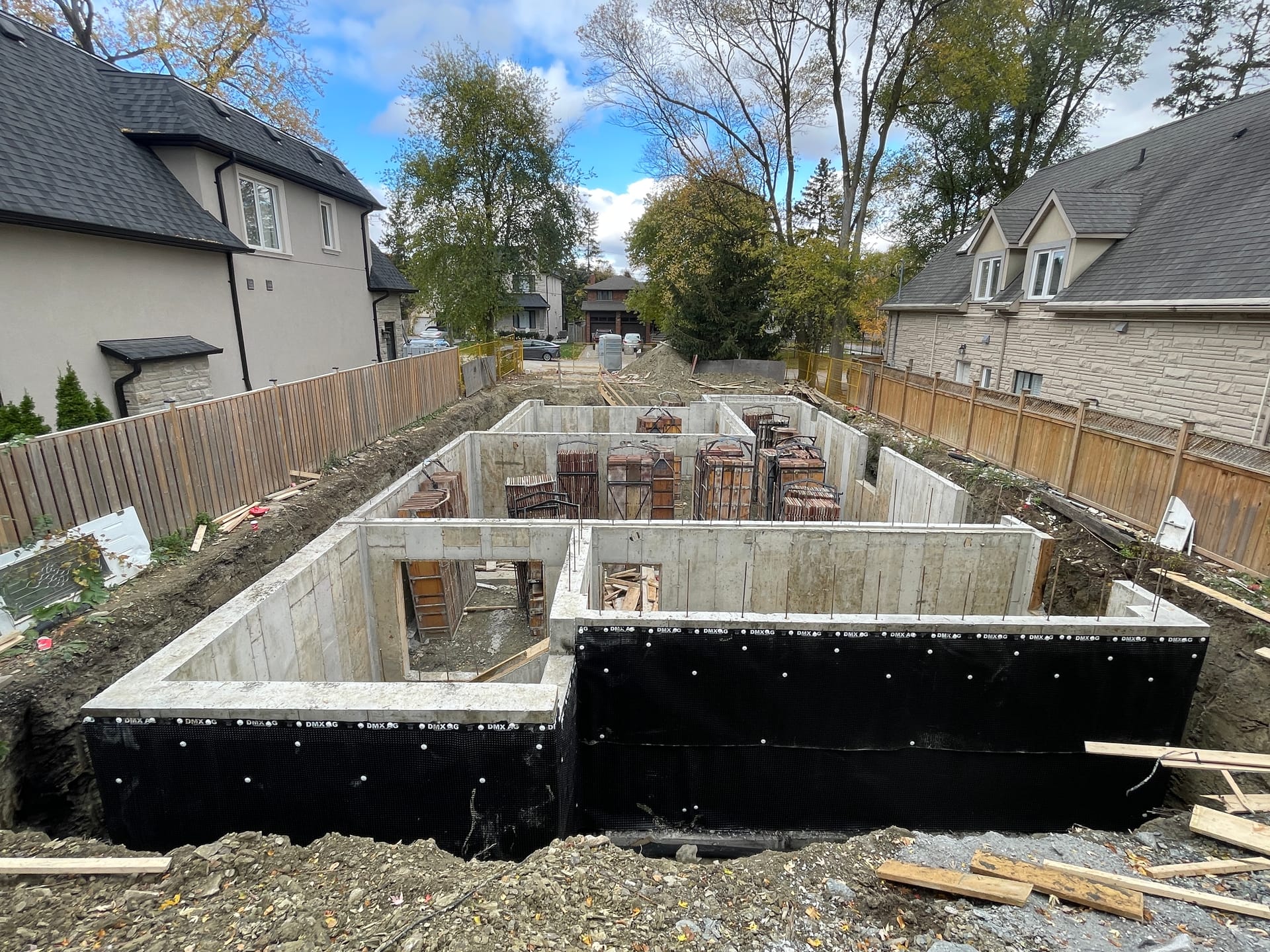 Completed foundation construction with waterproofing in Mississauga showing professional concrete forming work