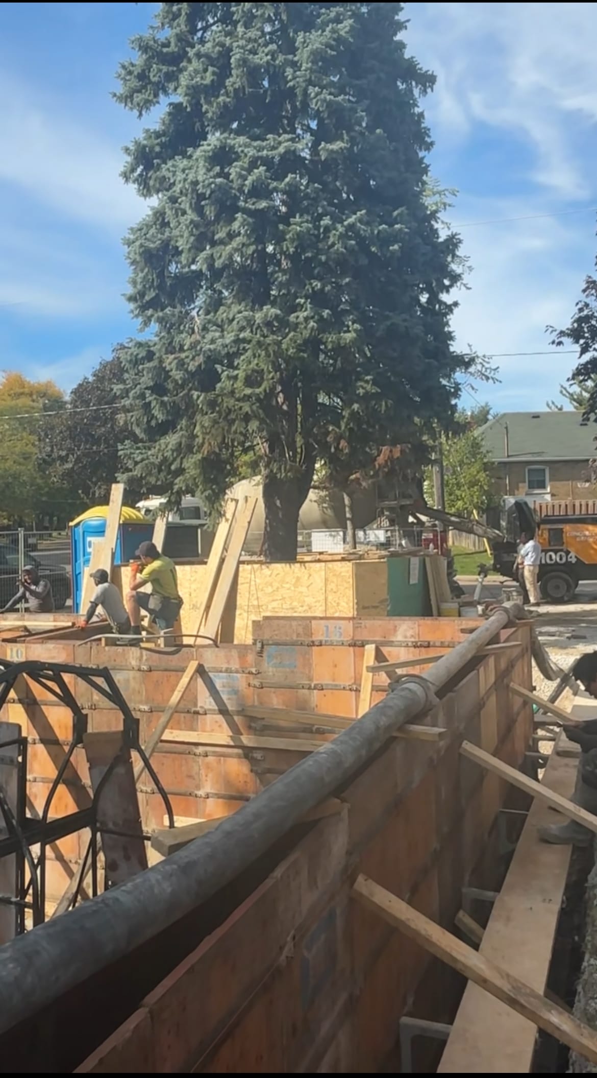 Garden suite formwork and bracing with multiplex walls visible in North York
