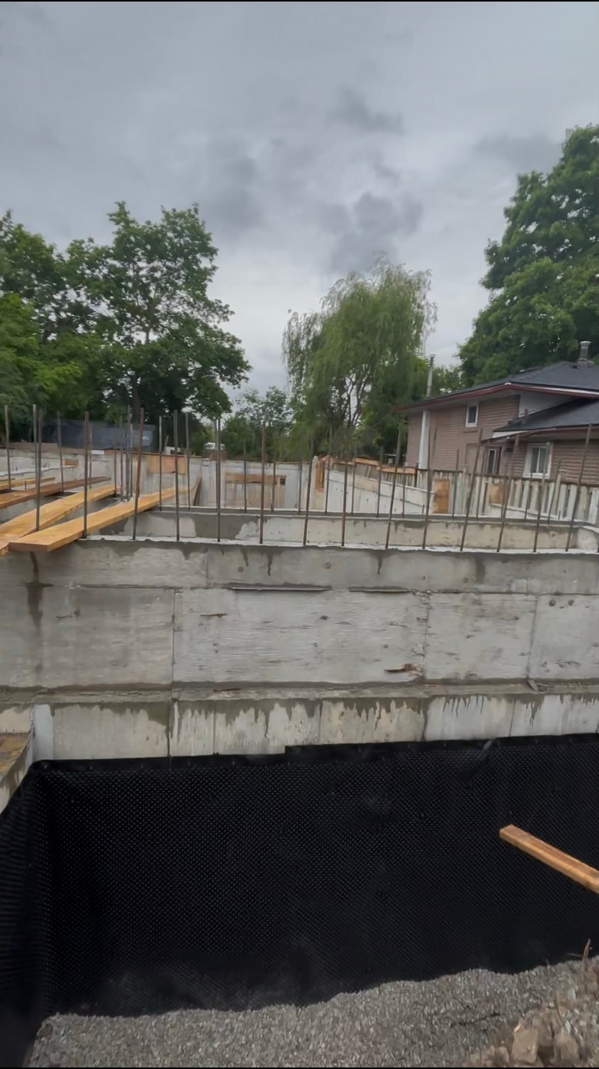 Finished concrete walls prior to waterproofing