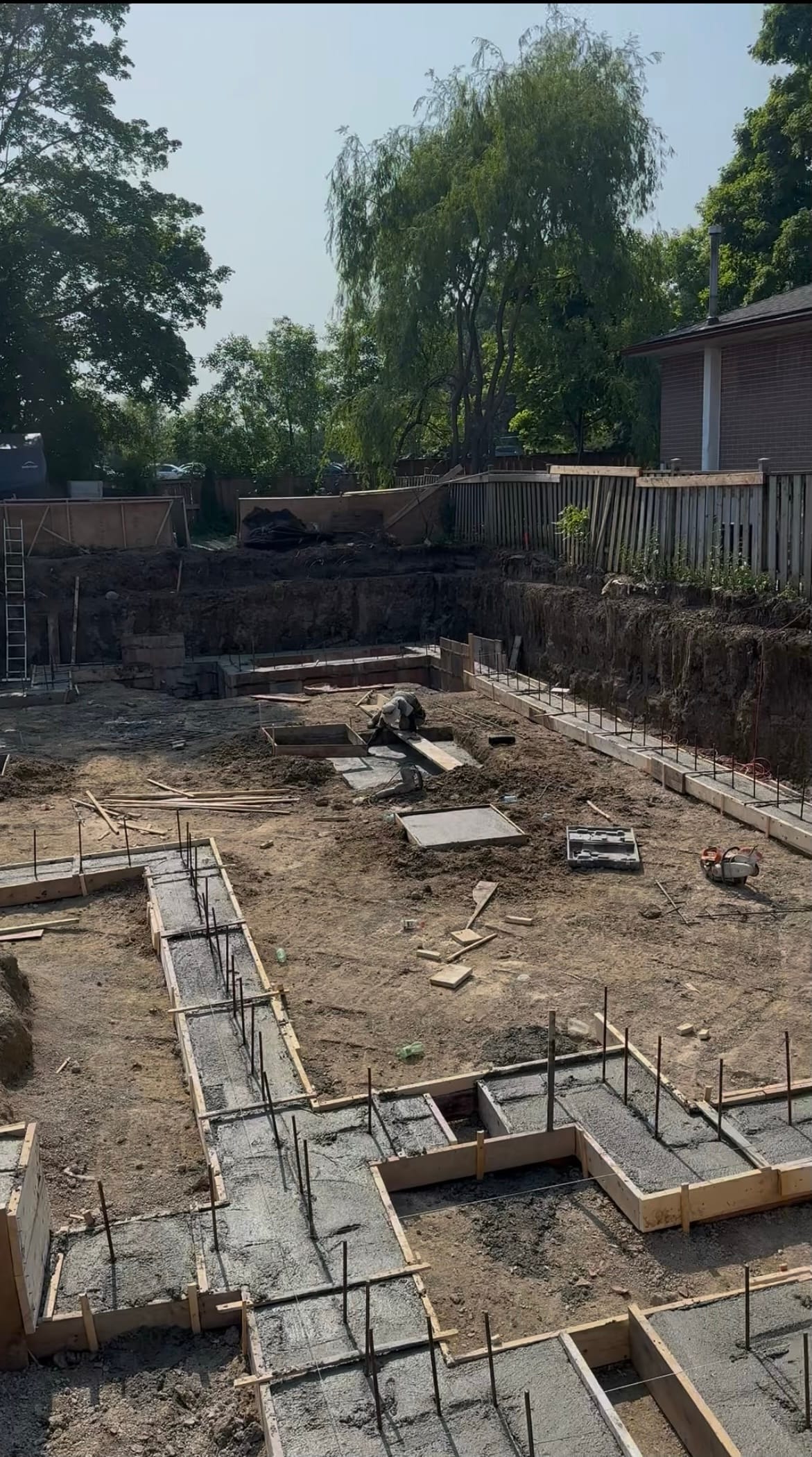 Stripped foundation walls during waterproofing application in North York Toronto