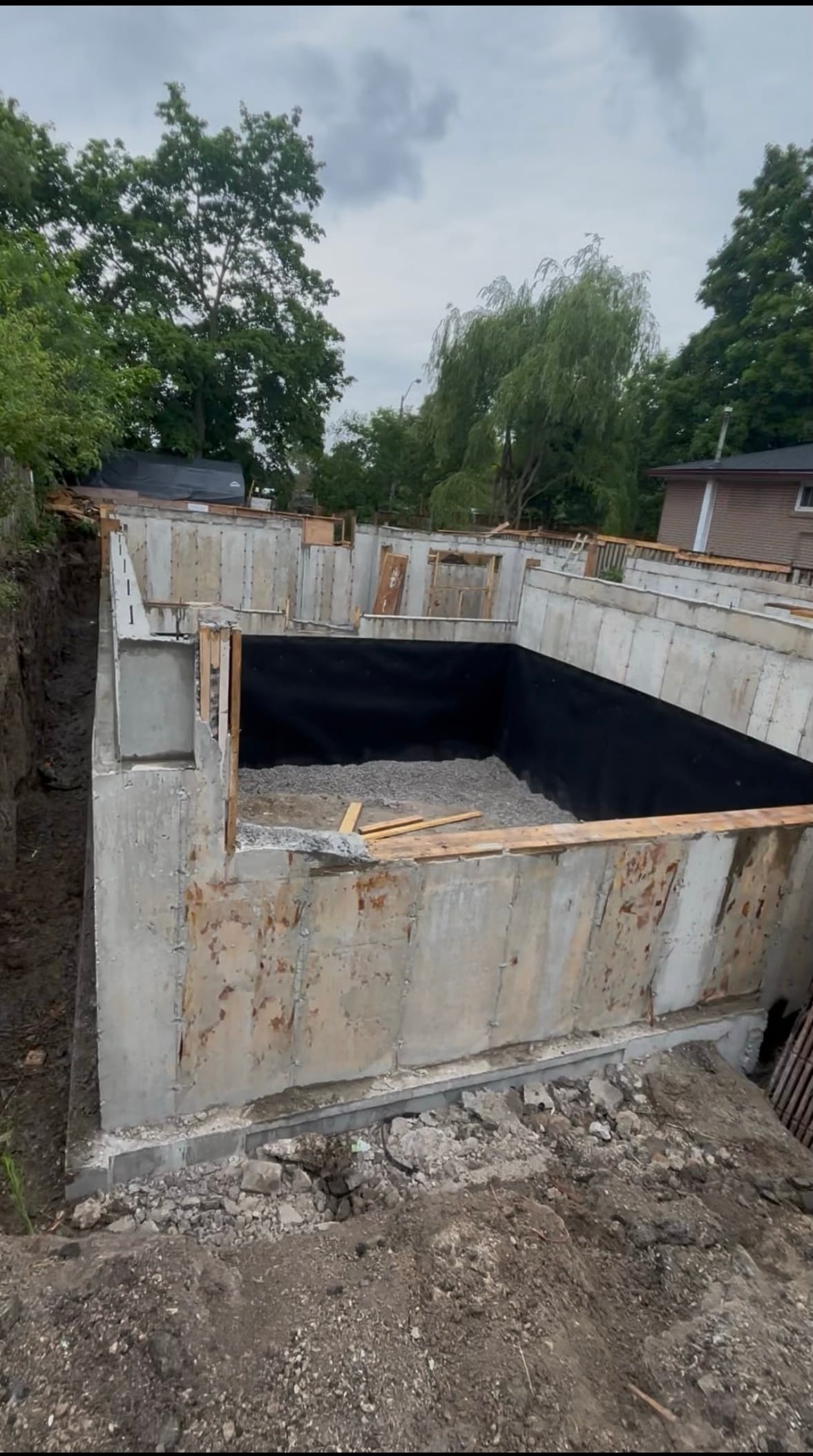 Footing being formed with rebar placement for concrete slab