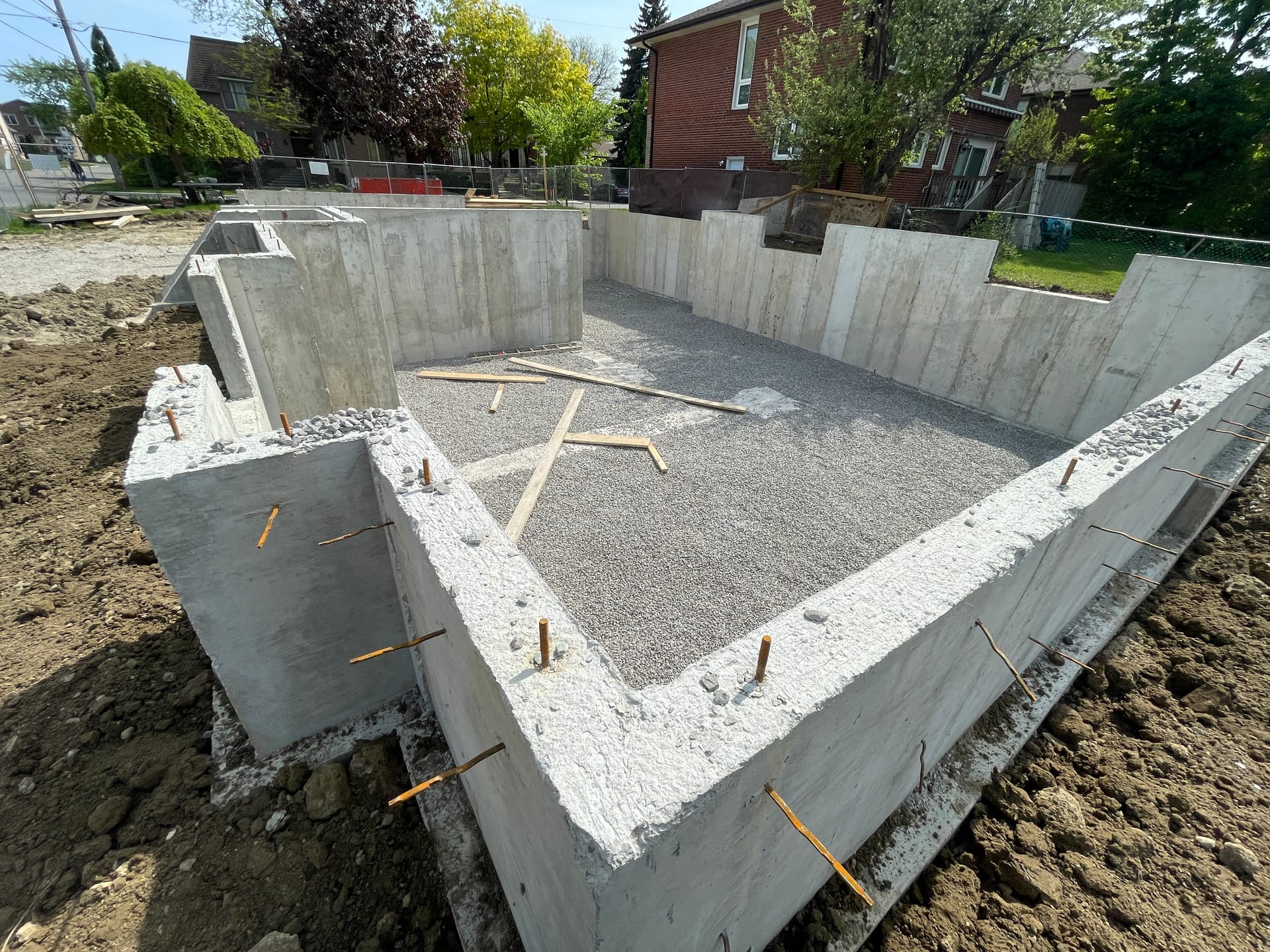 North York foundation formwork installation with poured footings and wall forms ready for assembly