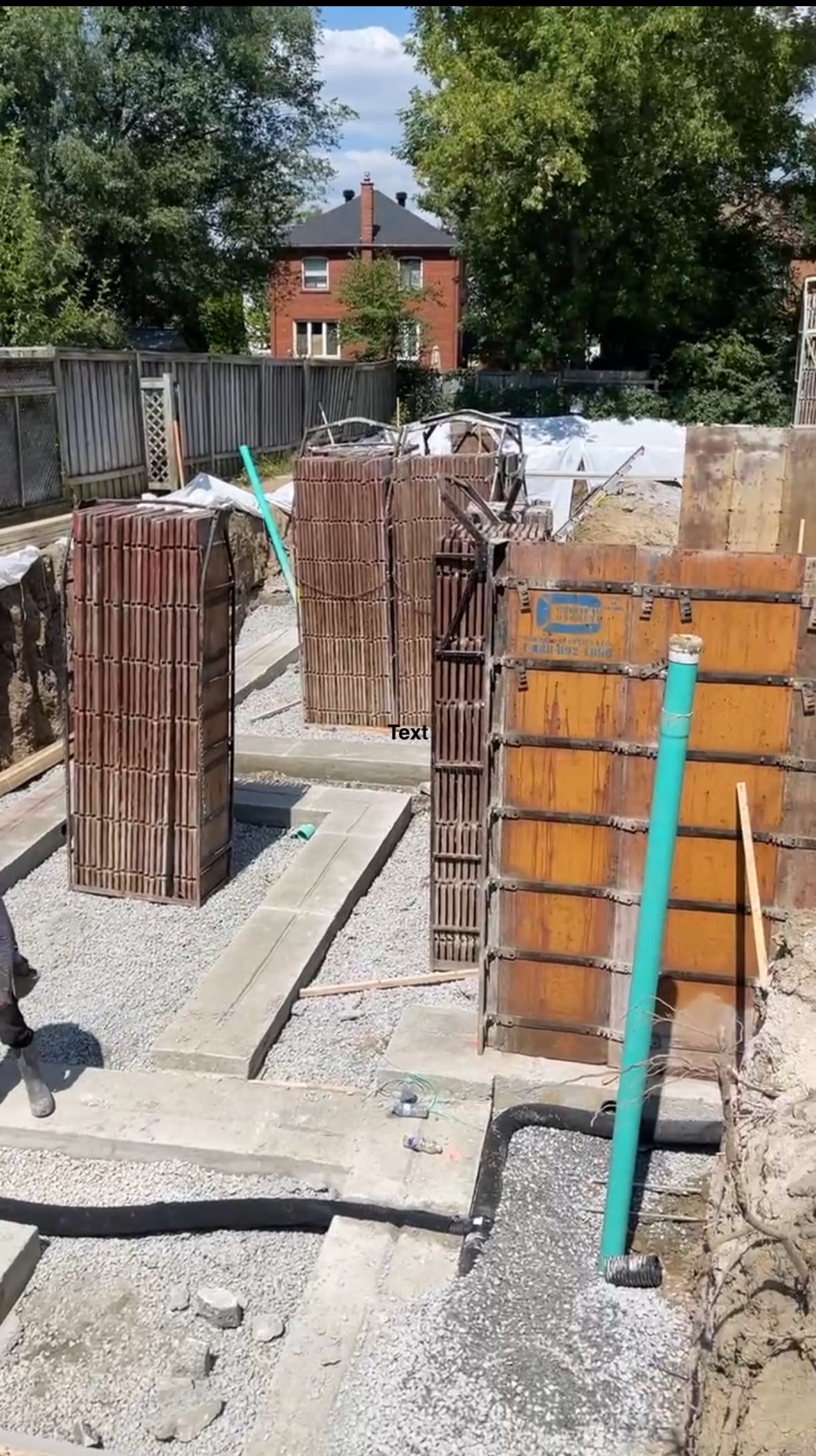 Formwork installation for multiplex foundation walls in North York Toronto residential project