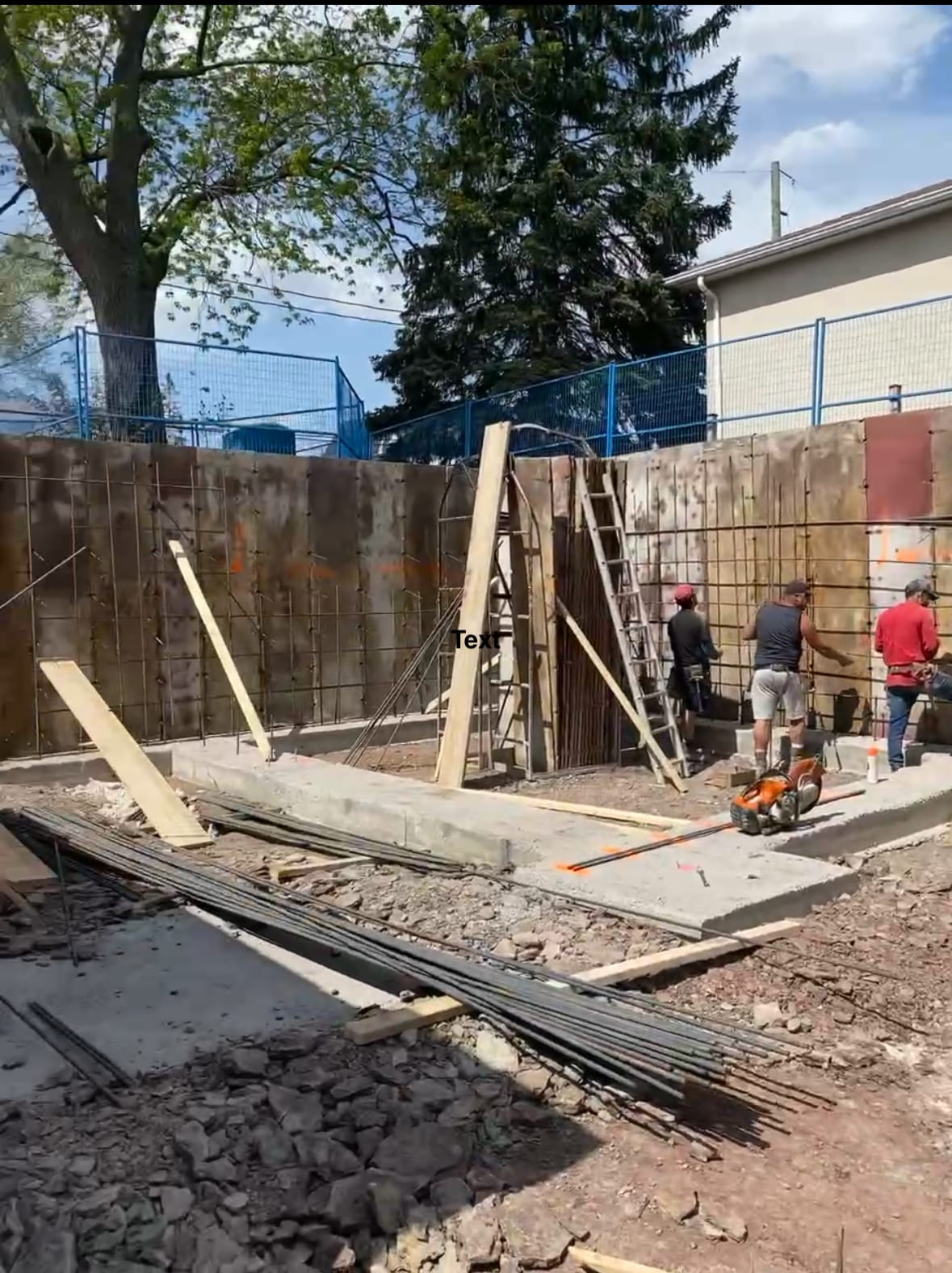 Unbraced foundation wall forms during assembly phase in Oakville foundation project