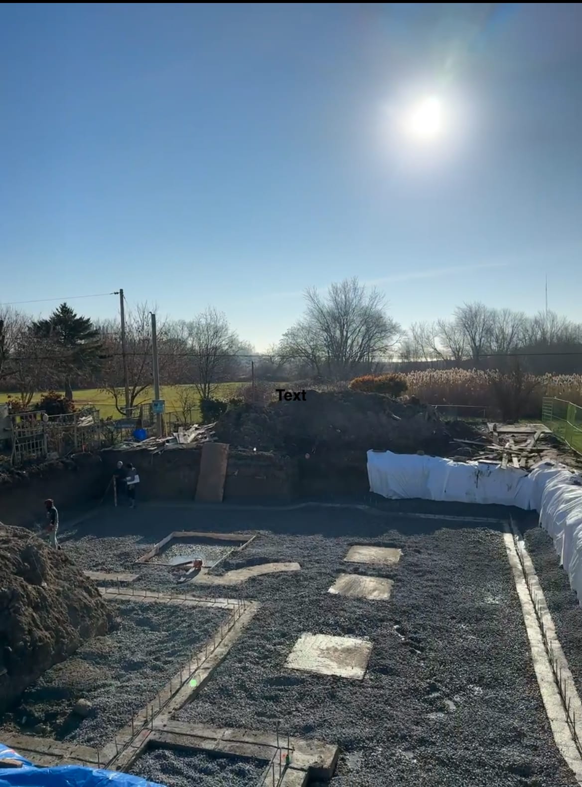 Freshly poured concrete footing completed at Pickering residential foundation site
