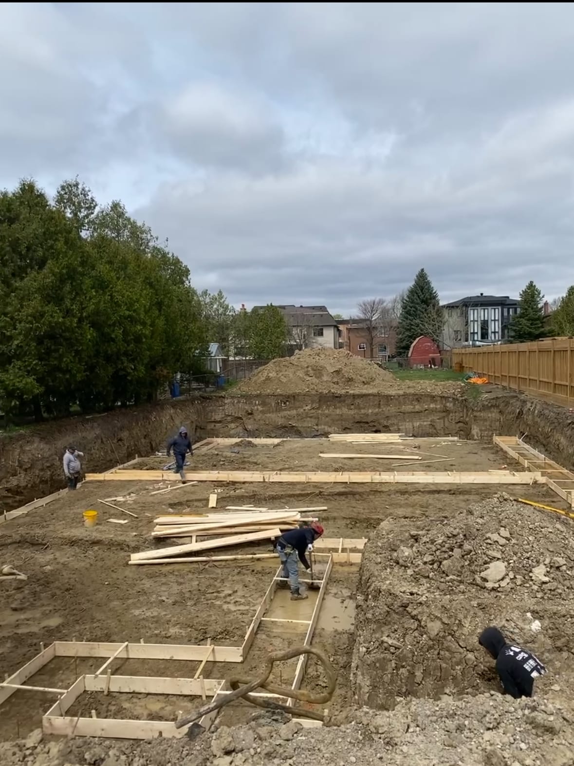 Foundation wall formwork assembly during residential construction in Richmond Hill Ontario