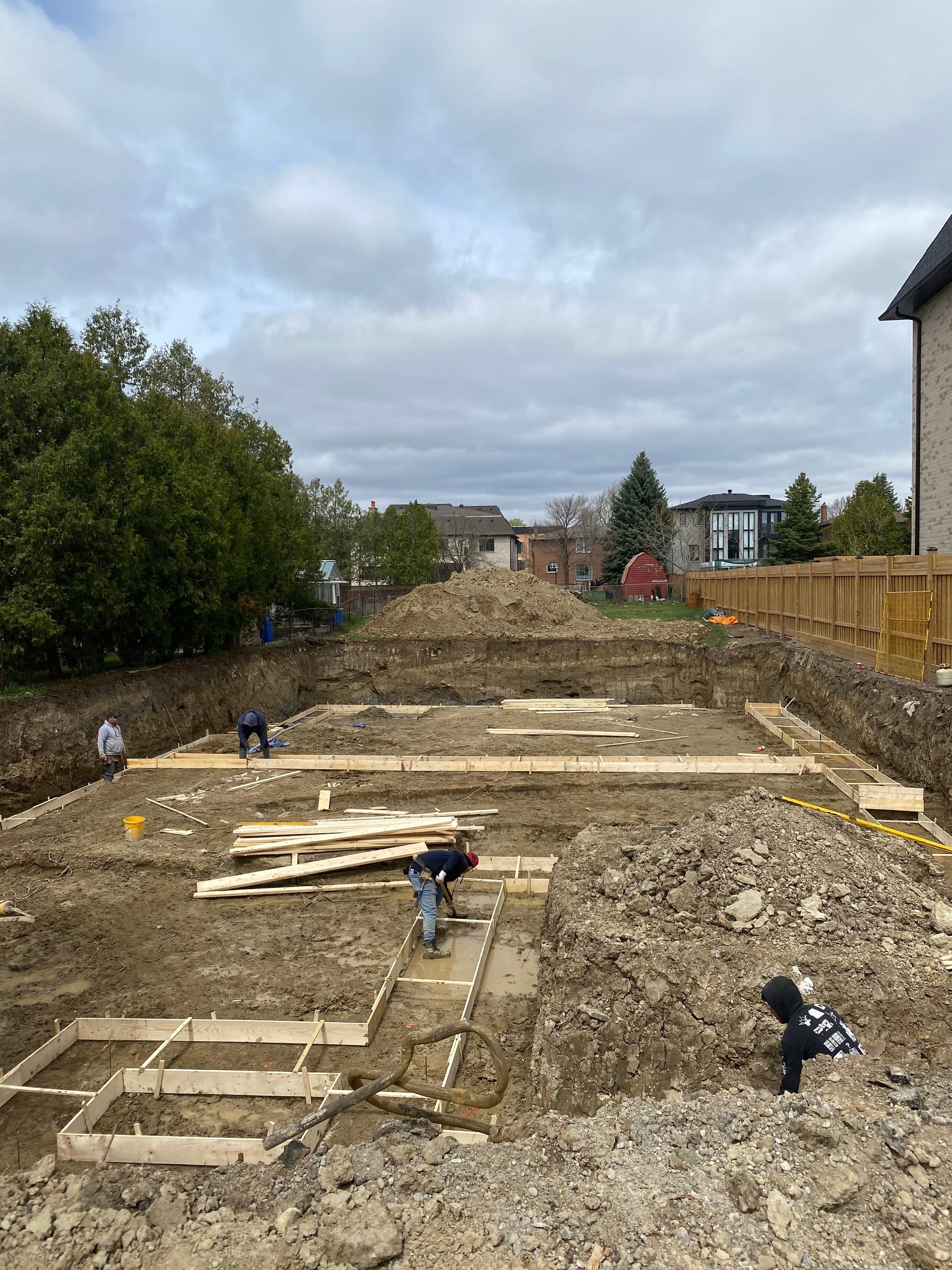 Completed concrete foundation walls after form stripping Richmond Hill York Region project