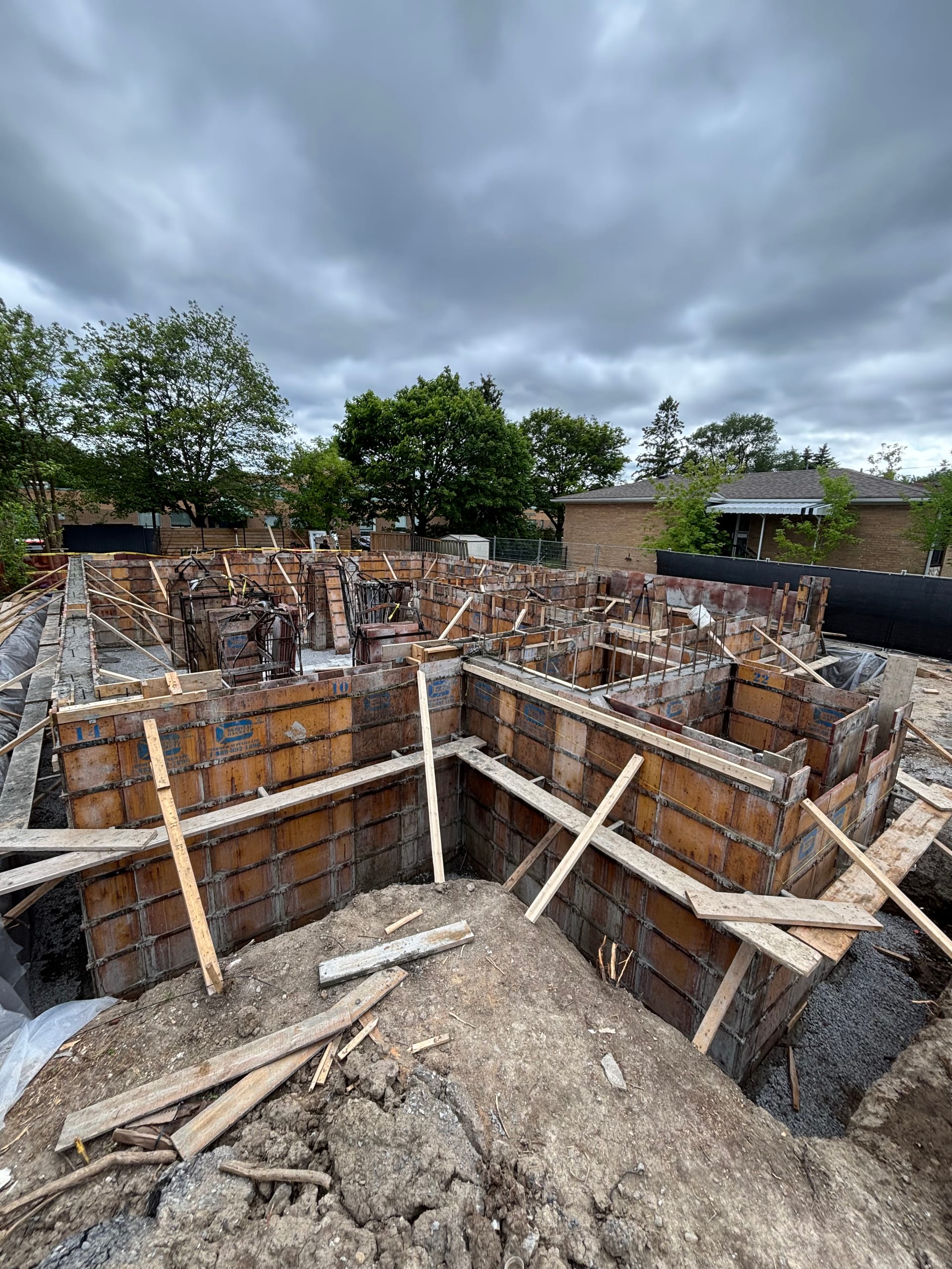 Wooden formwork assembly with rebar installation for Richmond Hill residential foundation construction