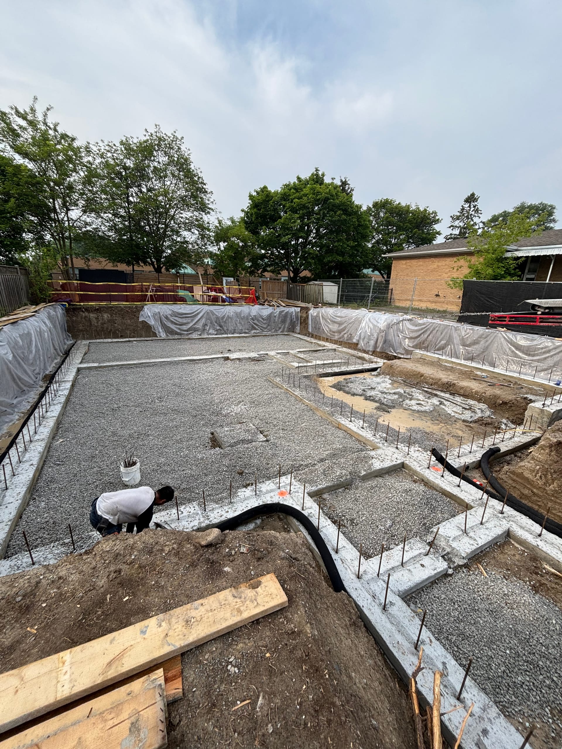 Backfilled foundation walls with waterproofing membrane completed on Richmond Hill residential property