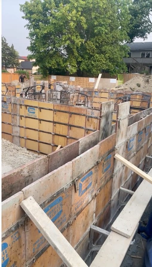 Finished residential foundation walls in Scarborough showing structural concrete forming detail and construction quality