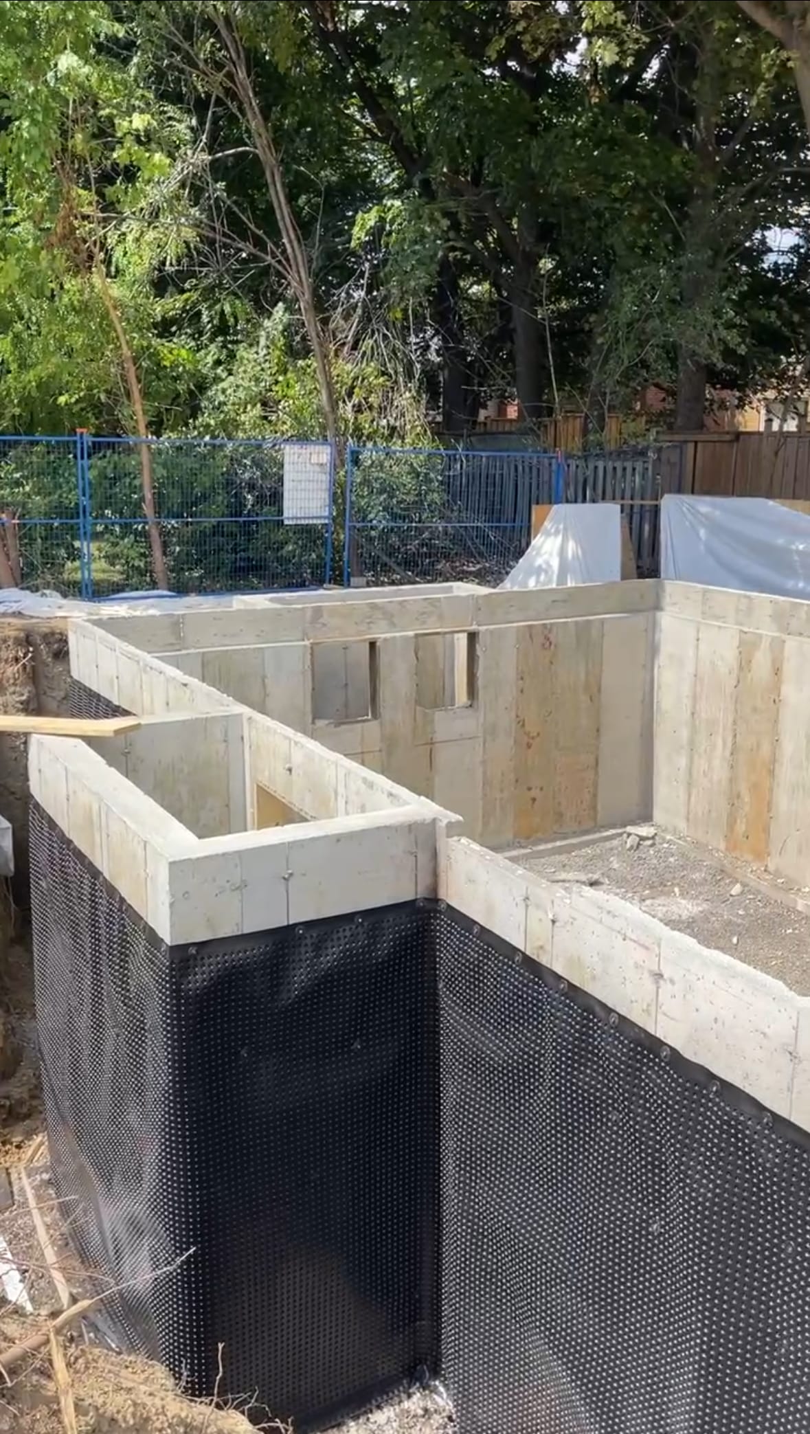 Completed waterproofed multiplex foundation walls in Scarborough showcasing professional concrete forming results