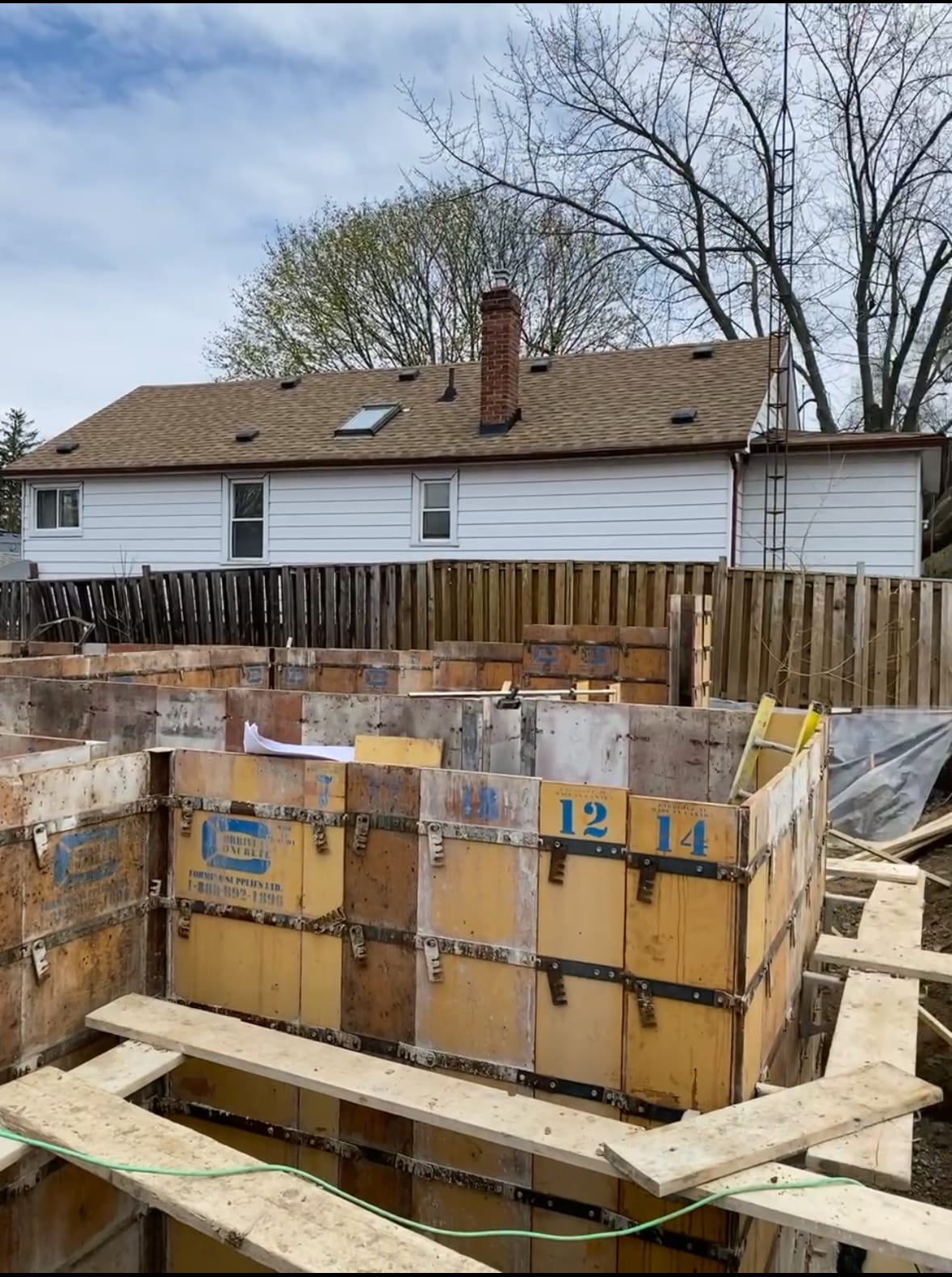 Foundation wall formwork assembly underway at Scarborough residential construction site