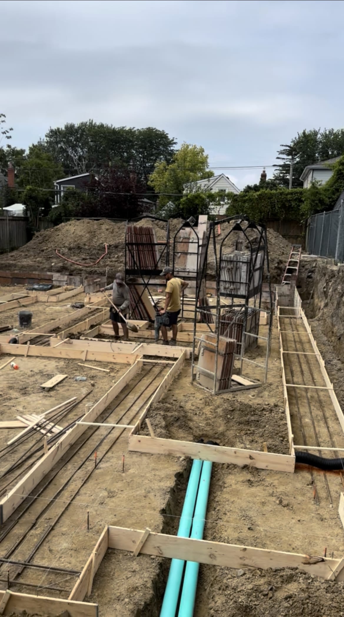 Concrete pouring underway for foundation footings at Scarborough residential project