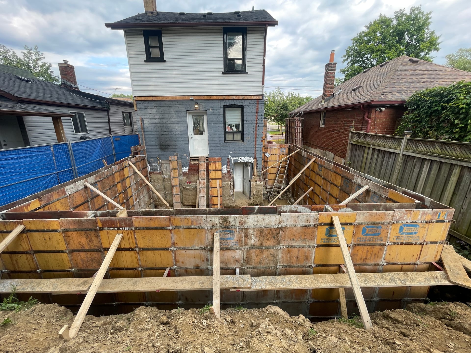 Foundation extension walls assembled and braced for concrete pour in Scarborough residential project