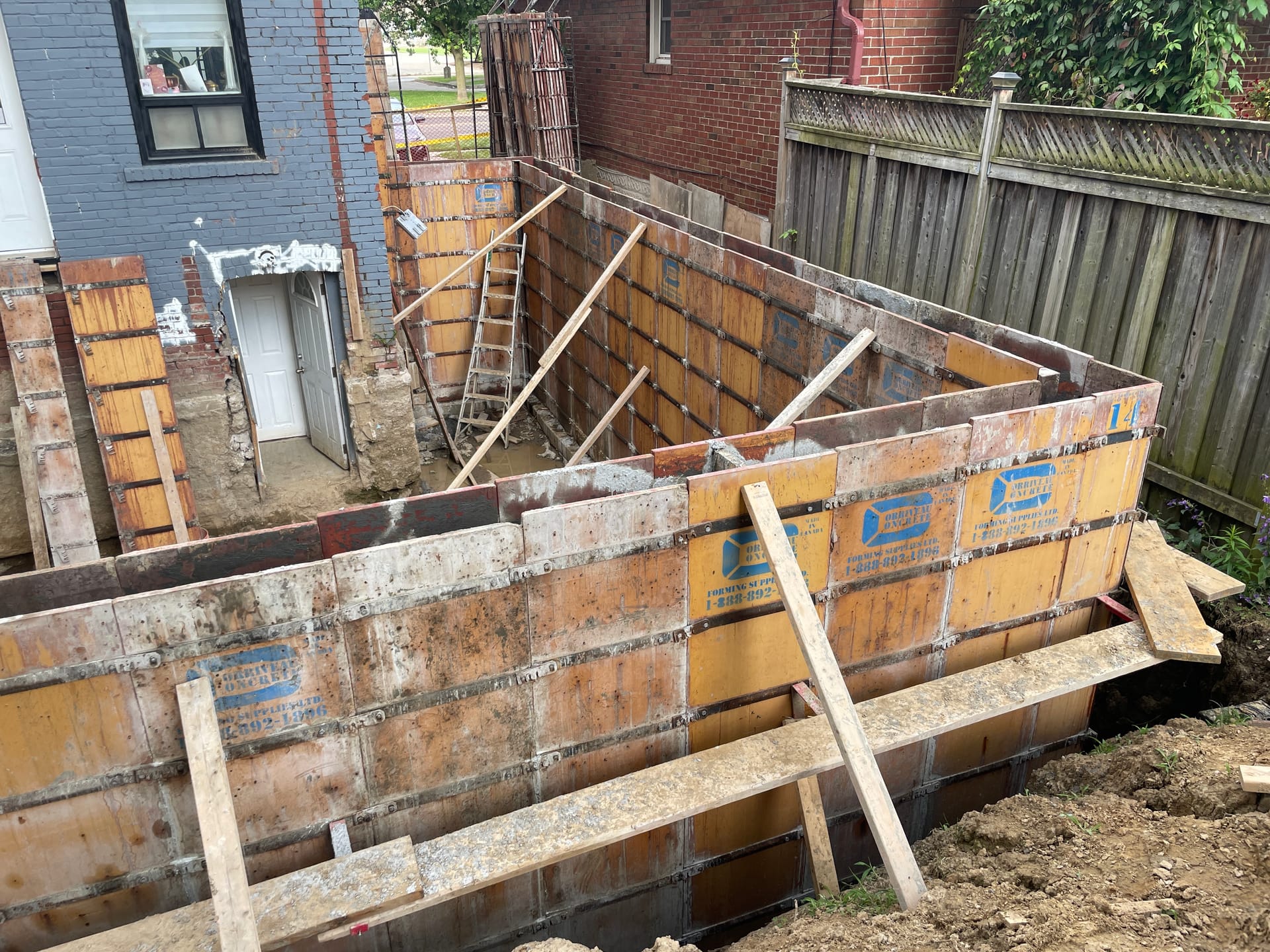 Braced formwork system ready for concrete placement in Scarborough foundation extension project