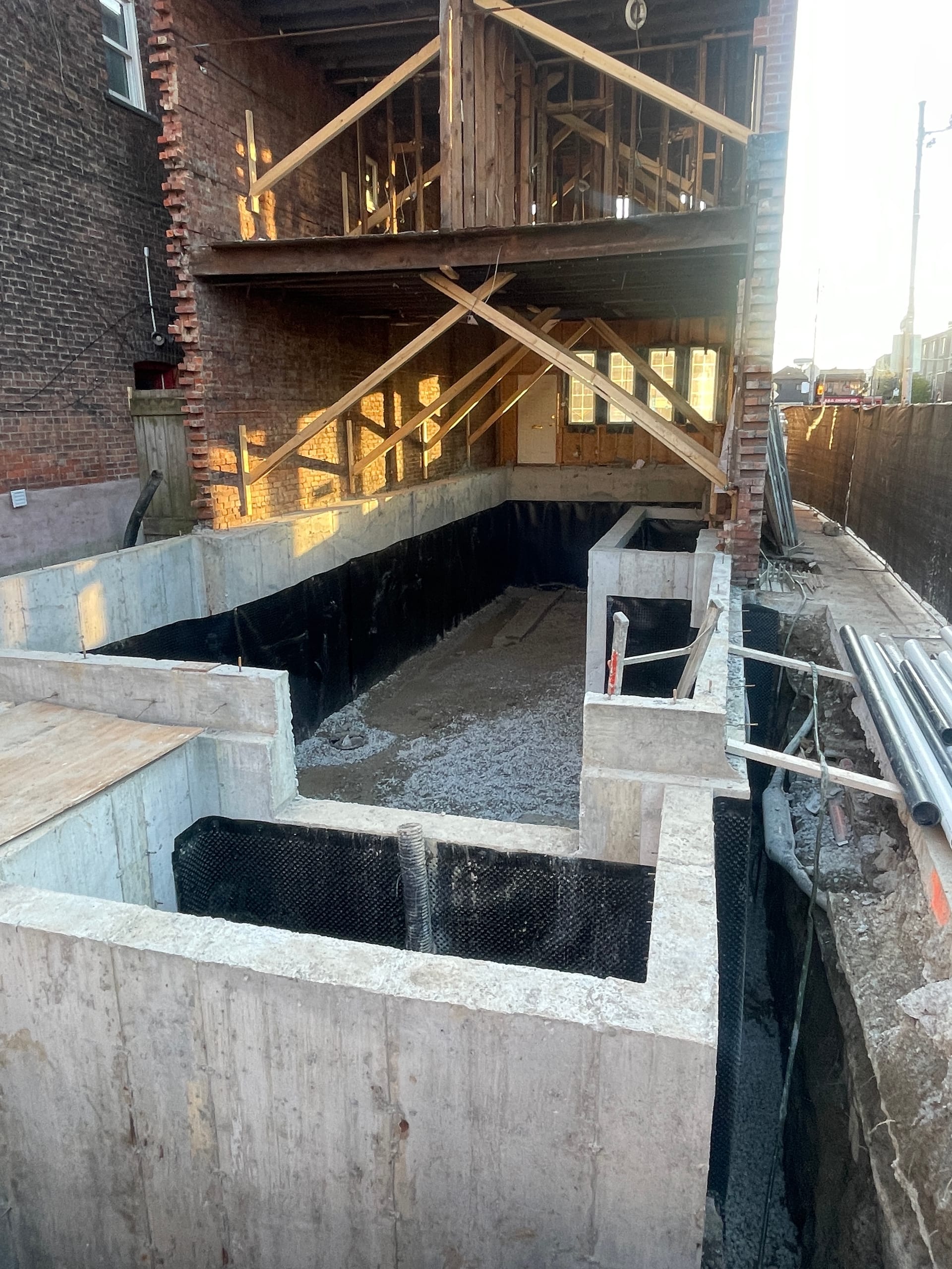 Structural concrete foundation walls for residential extension completed in Toronto