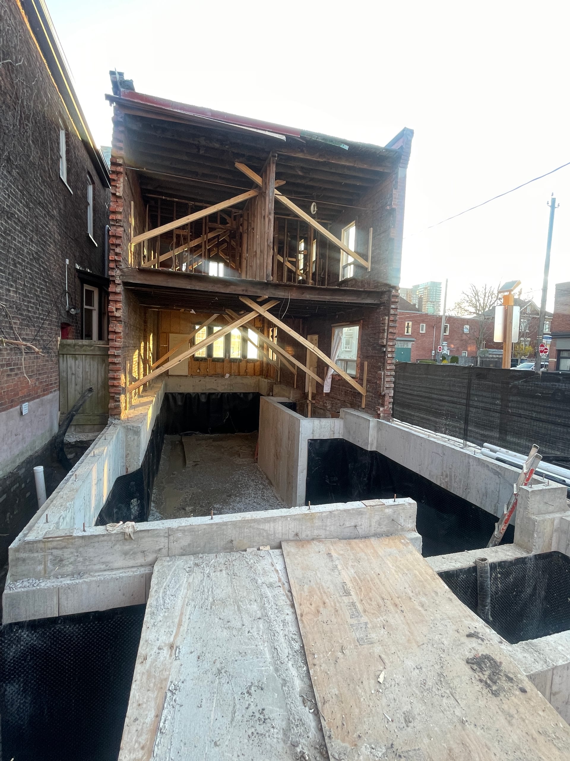 Alternative view of foundation formwork installation during wall assembly phase Toronto extension project