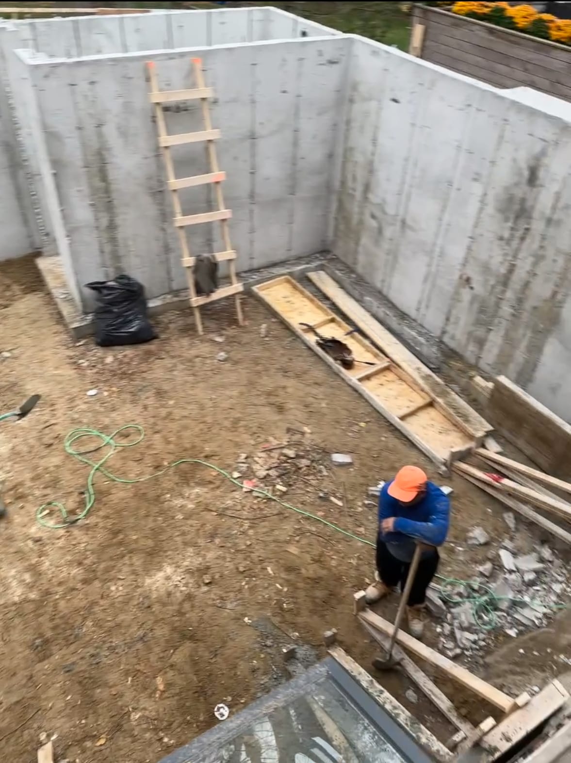 Foundation extension wall formwork assembly with rebar installation in Toronto residential project