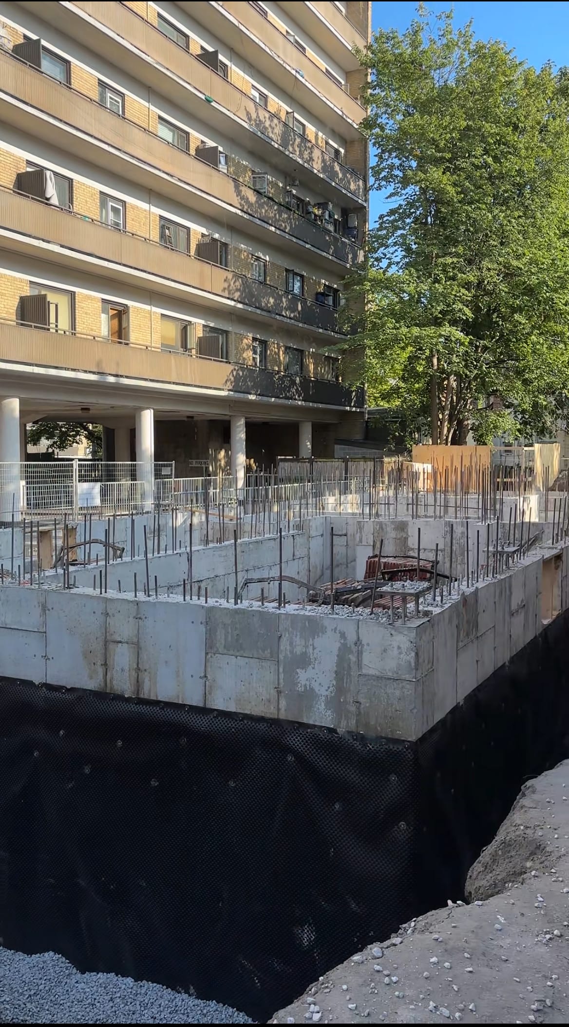 Formwork wall assembly with rebar installation for six-storey multiplex foundation in Toronto