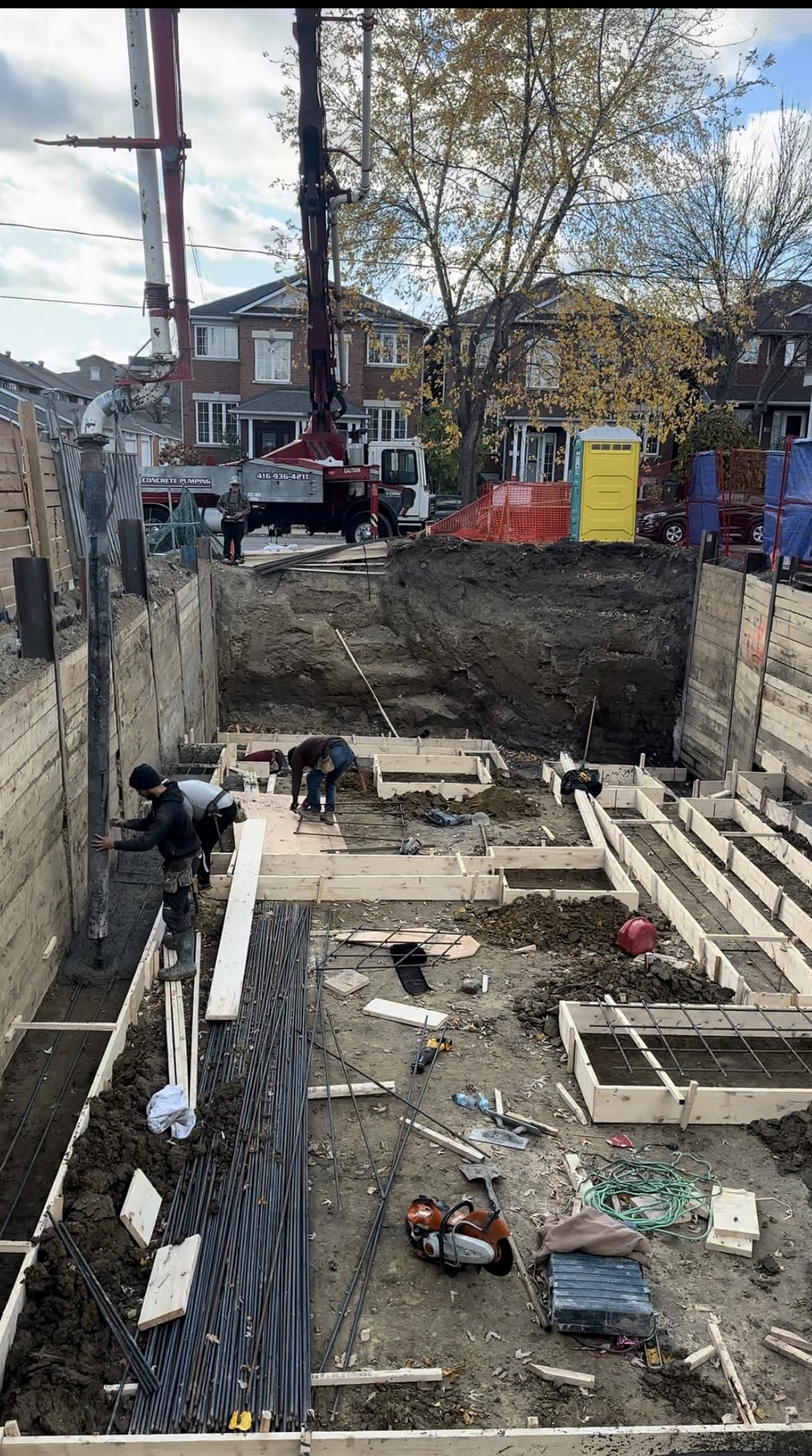 Steel rebar installation in formwork for Toronto foundation footings