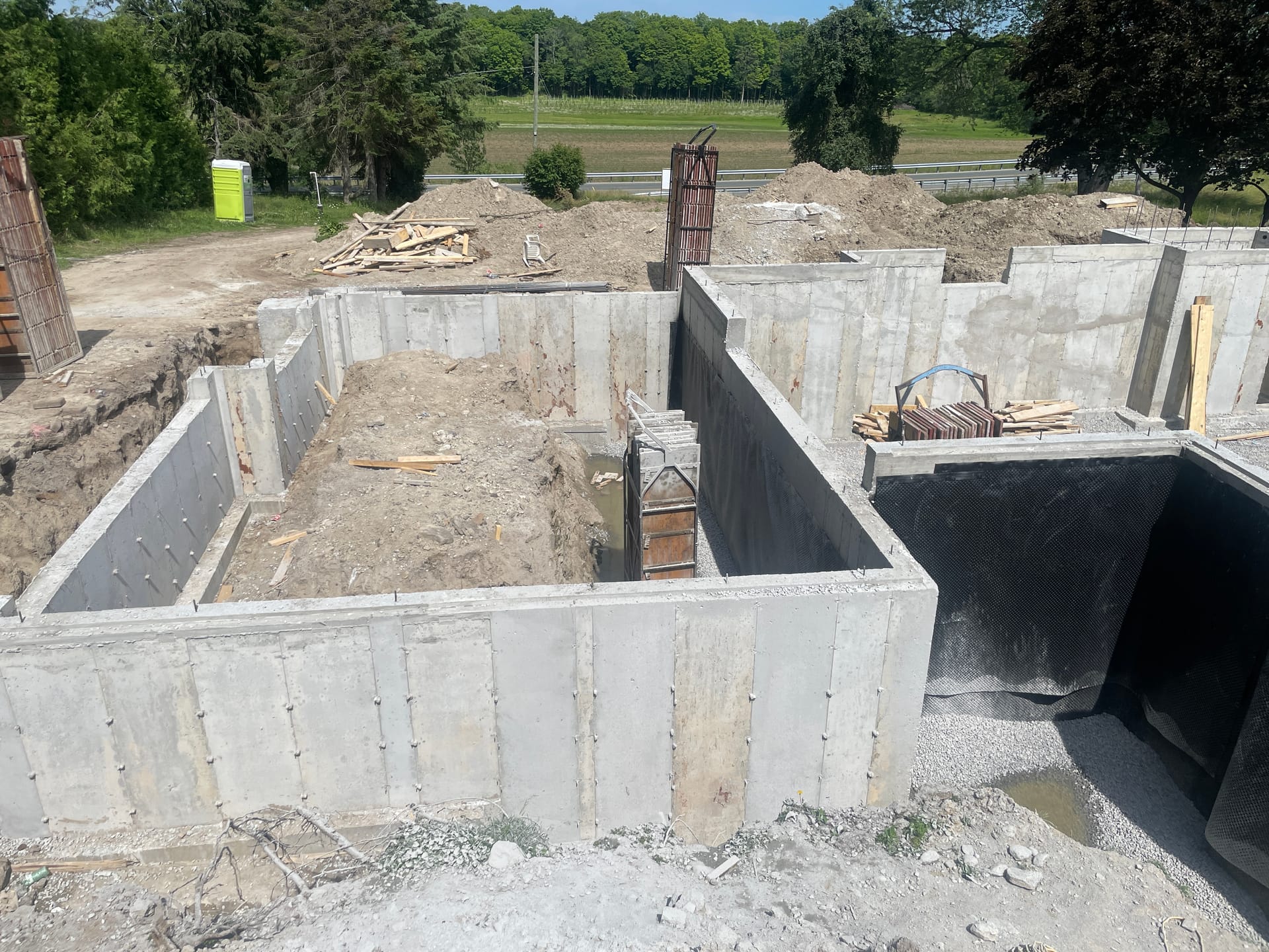 Freshly poured concrete footing for slab foundation