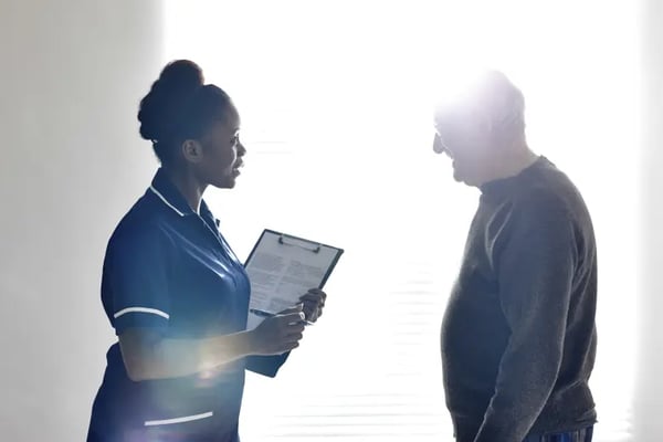 Nurse talking to injured patient