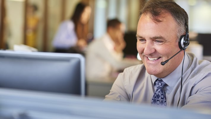 Injury solicitor helping a client on the phone