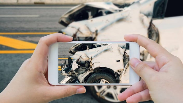Photographing a car crash accident scene